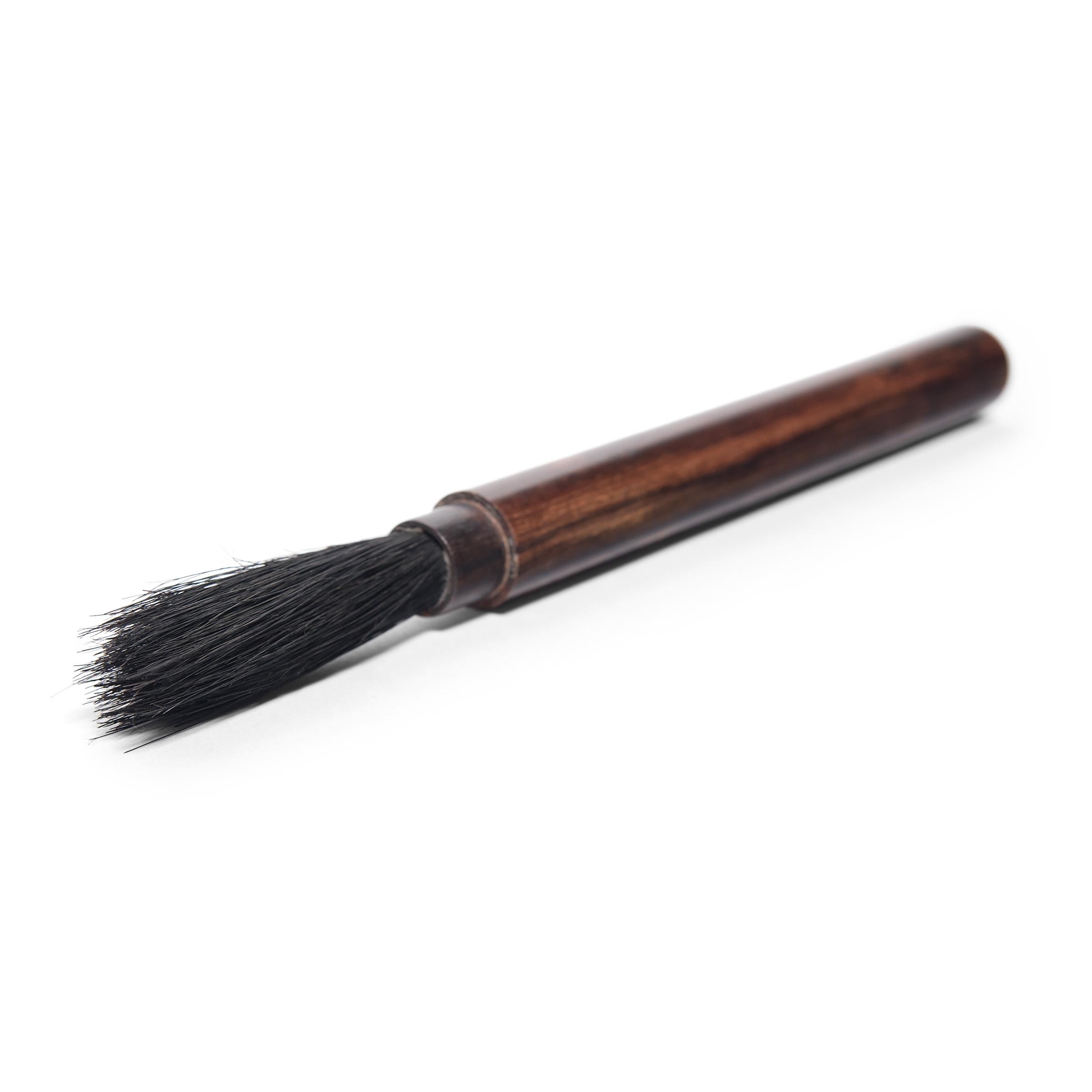 Dated to the early 20th century, this fine calligraphy brush would have been an essential tool for a Qing-dynasty scholar-official, used to draft official documents or compose poetry. A scholar's tools were symbols of his status and were frequently