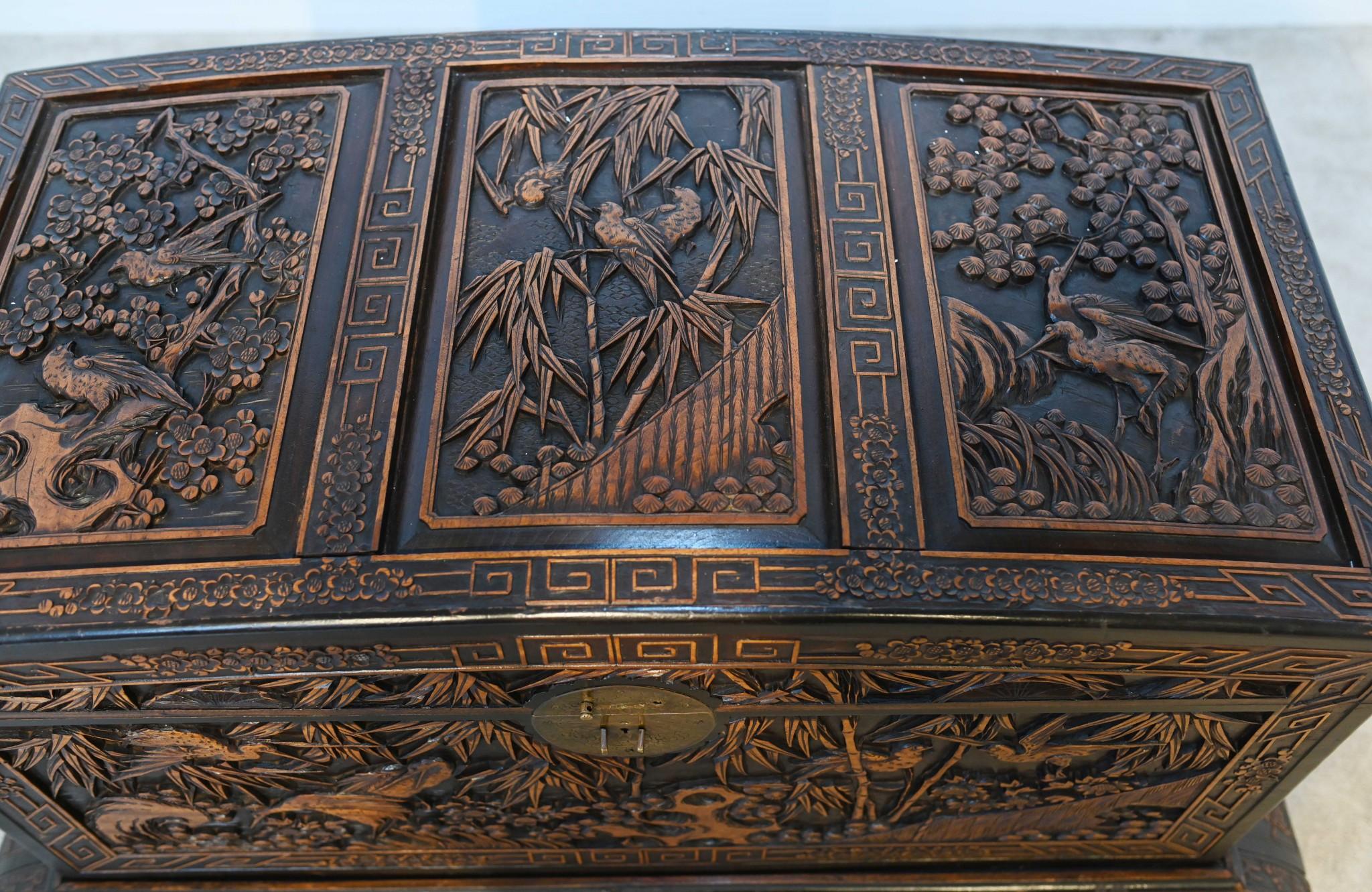 You are viewing a gorgeous Chinese camphor chest on stand
That's what really attracted us to this piece as it's unusual to see these come with a stand like this
Such a great decorative piece, the intricately carved chest looks great on the elegant