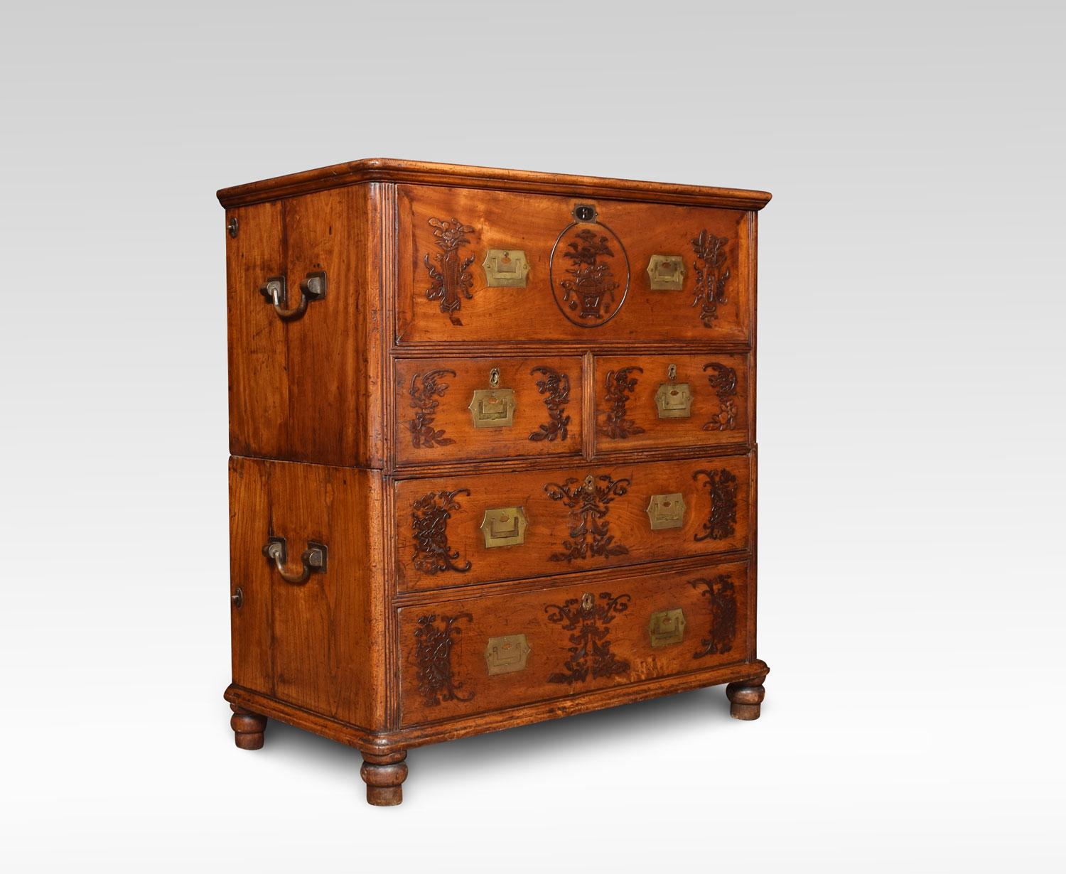 19th century Chinese camphor wood secrétaire Campaign chest in two sections, the secrétaire frieze drawer with fall-front writing surface and various compartments, above two short and two long drawers, enclosed by reeded corners, with solid brass