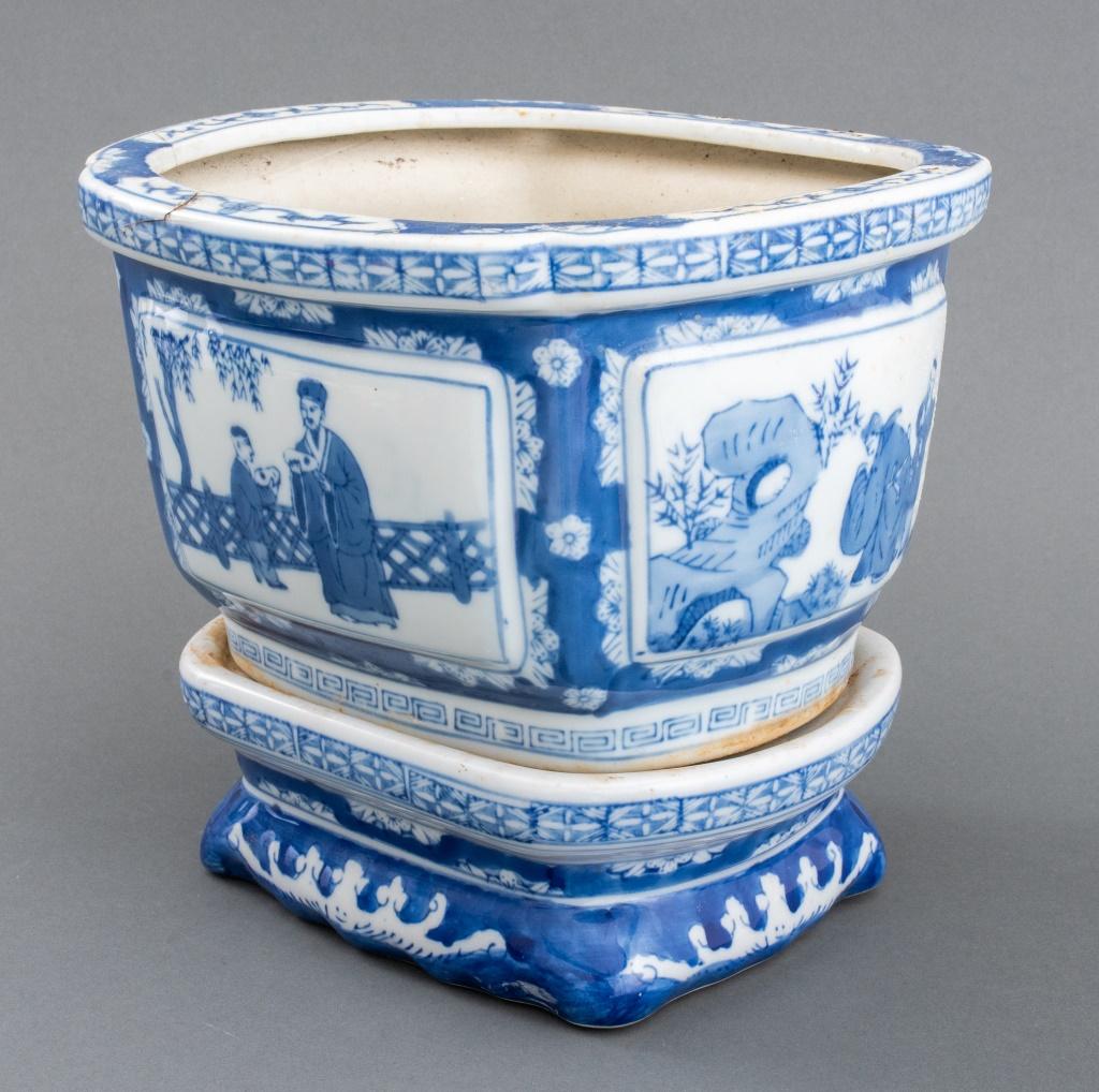 Chinese porcelain Canton blue and white tree pot or cache-pot on stand, the pot with sides decorated with Scholarly vignettes within cartouches, the base with organic motifs, 9