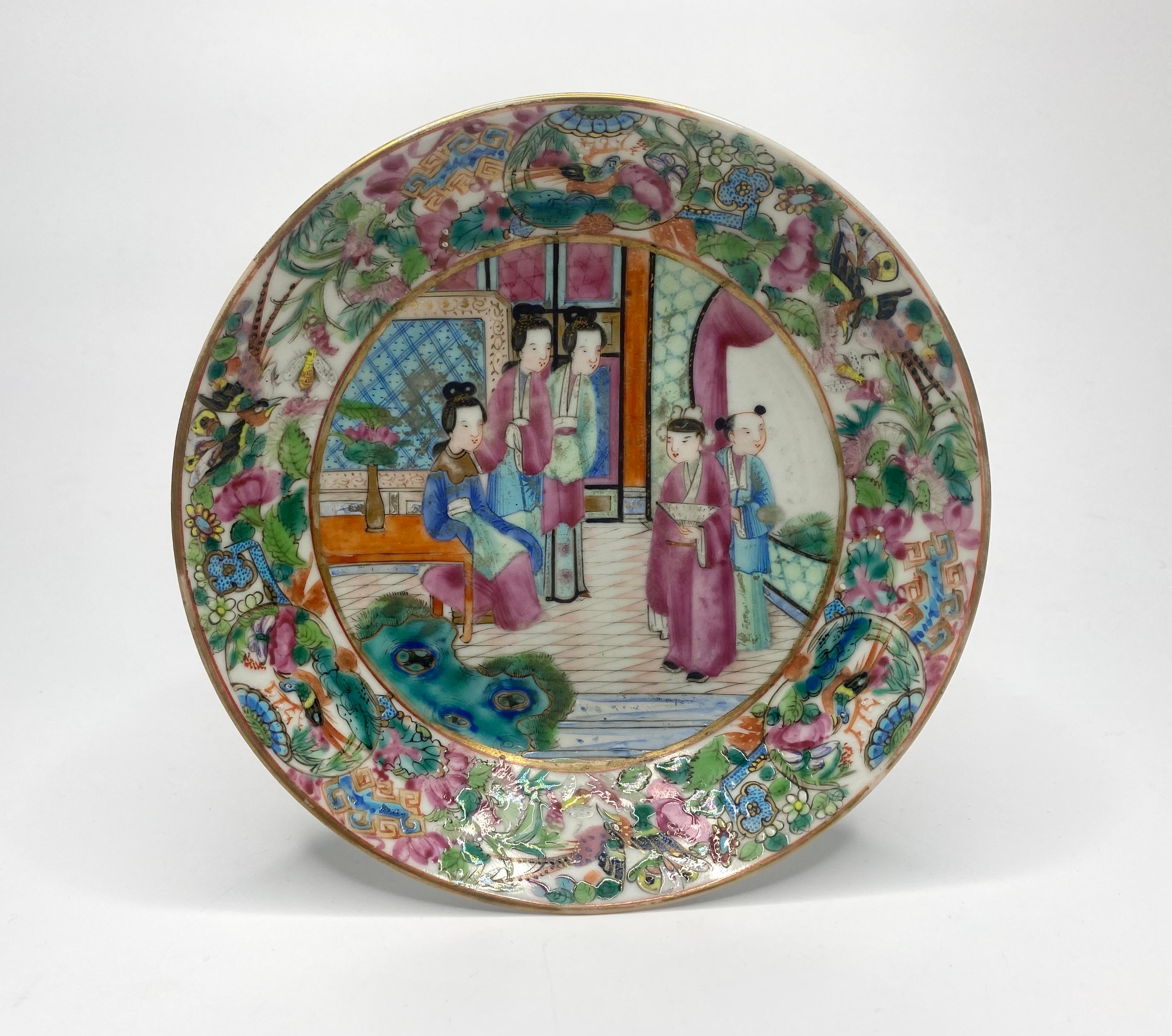 Chinese porcelain Cantonese cup and saucer, c. 1850, Qing Period. The large ‘London shape’ cup, finely hand painted in the Cantonese style, with a continuous scene of figures in a garden setting, in famille rose enamels. Internally painted with a