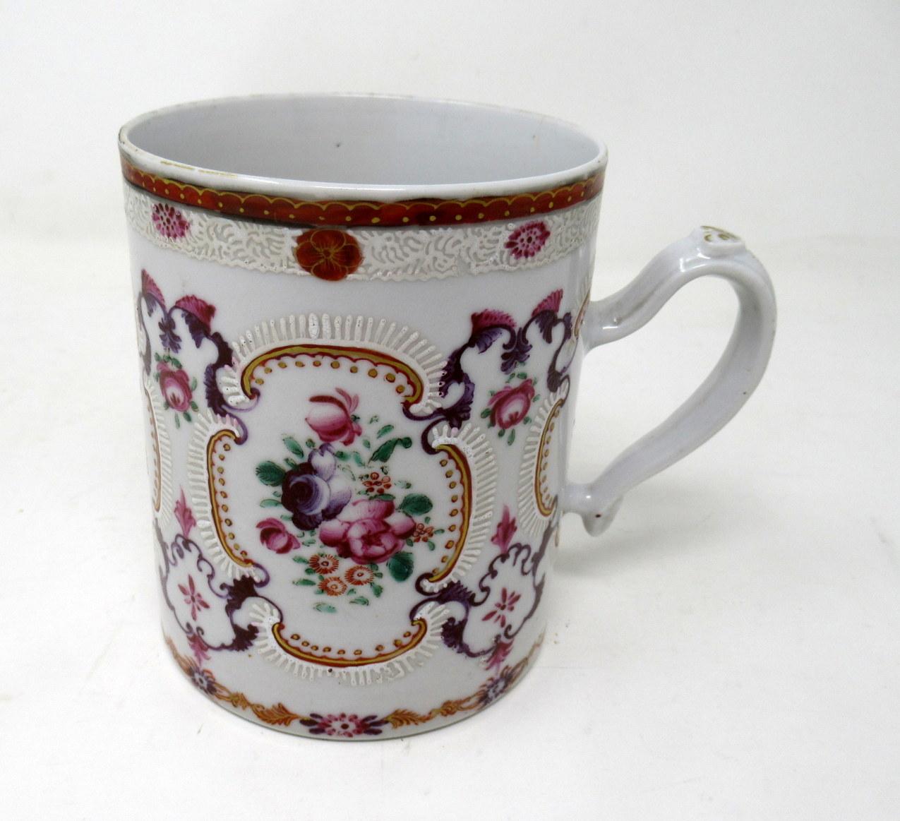 Fine Chinese porcelain Famille rose Mandarin Tankard mug of outstanding quality and impressive size.

Hand decorated in brightly colored enamels featuring four large central panels depicting beautifully hand painted summer flowers and old roses