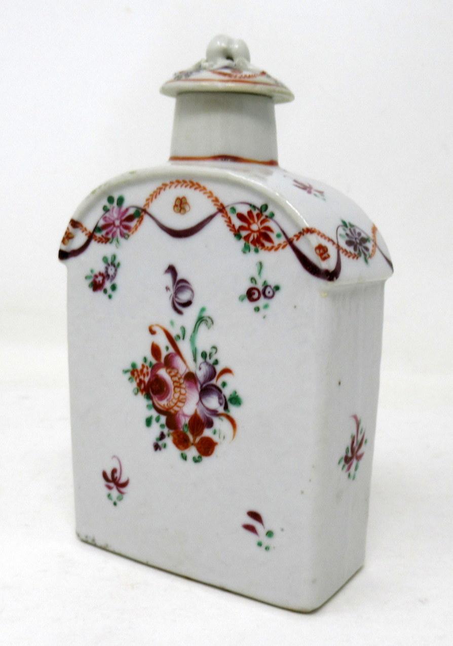 Stunning rare Famille Rose “European-subject” Chinese porcelain tea caddy of fine quality, 

circa 1780. 

Exquisitely enameled to the front and back face of the dome-shaped rectangular body with Summer Flowers, Garlands and Sprays in colours.
