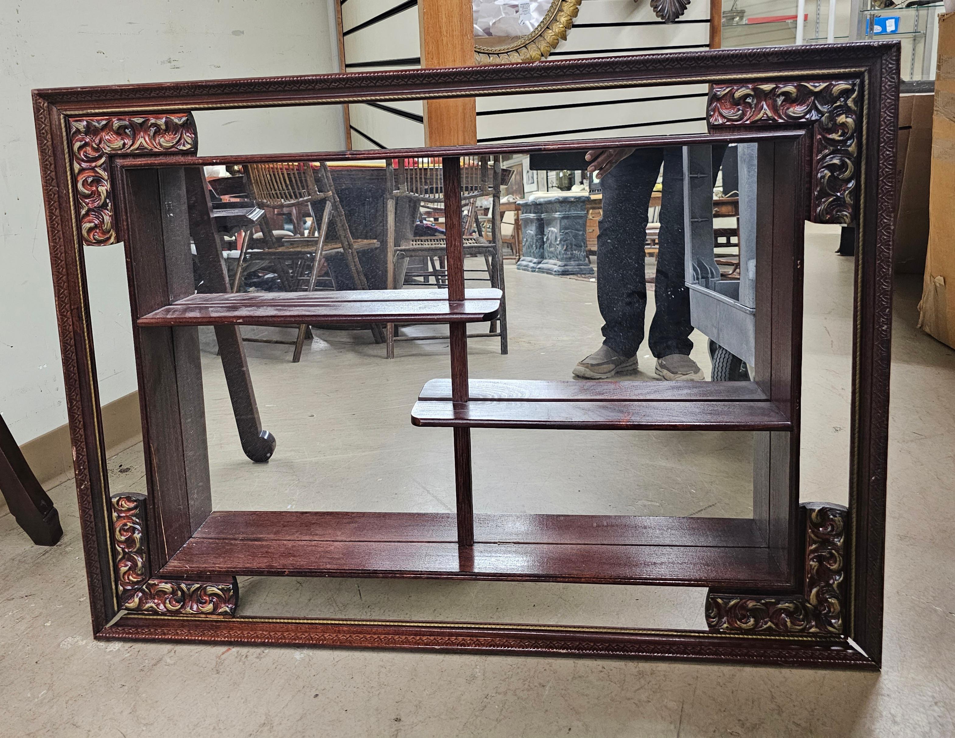 Chinese Carved and Lacquered Wood Framed Mirrored-Back Etagere In Good Condition For Sale In Germantown, MD