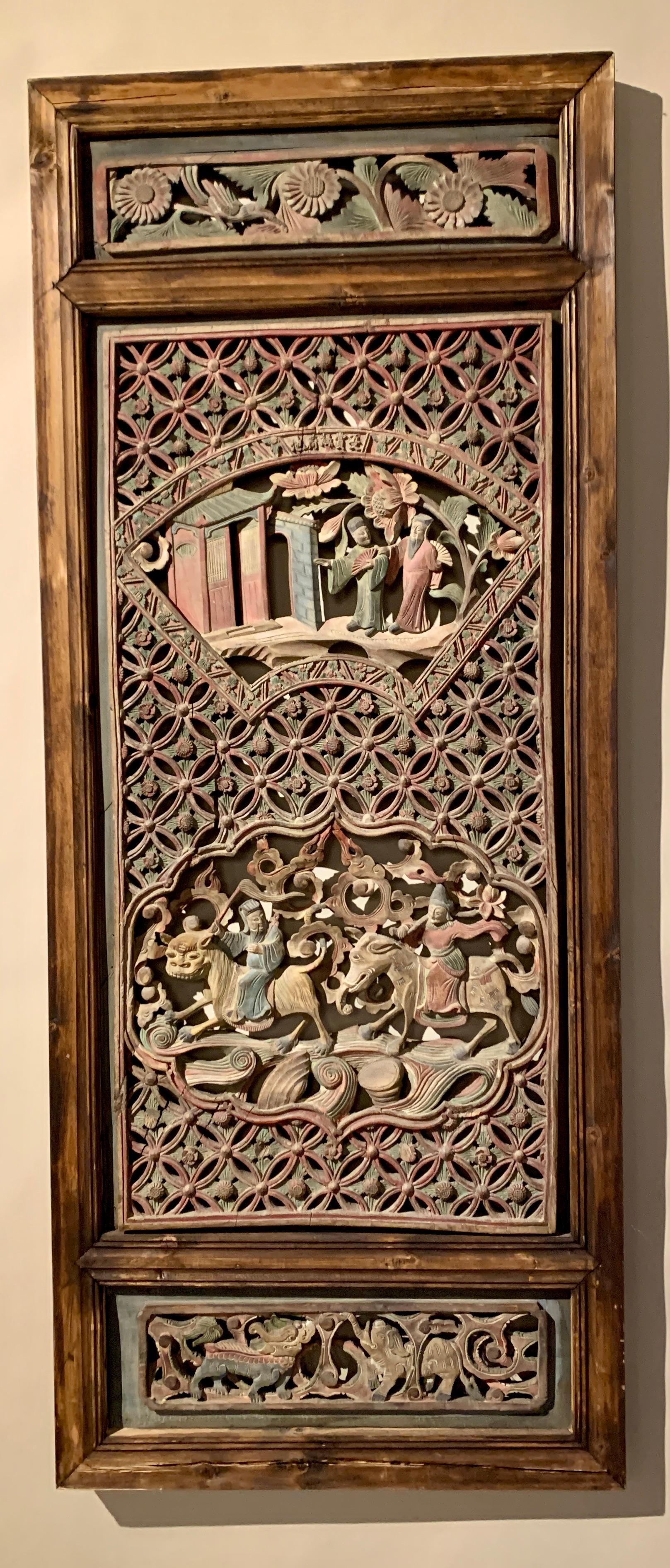 A wonderful set of four Chinese carved, pierced, and polychromed camphor wood screen panels with images of the Four Seasons and Eight Immortals, Qing Dynasty, mid to late 19th century, China.

Each panel divided into three sections. The top