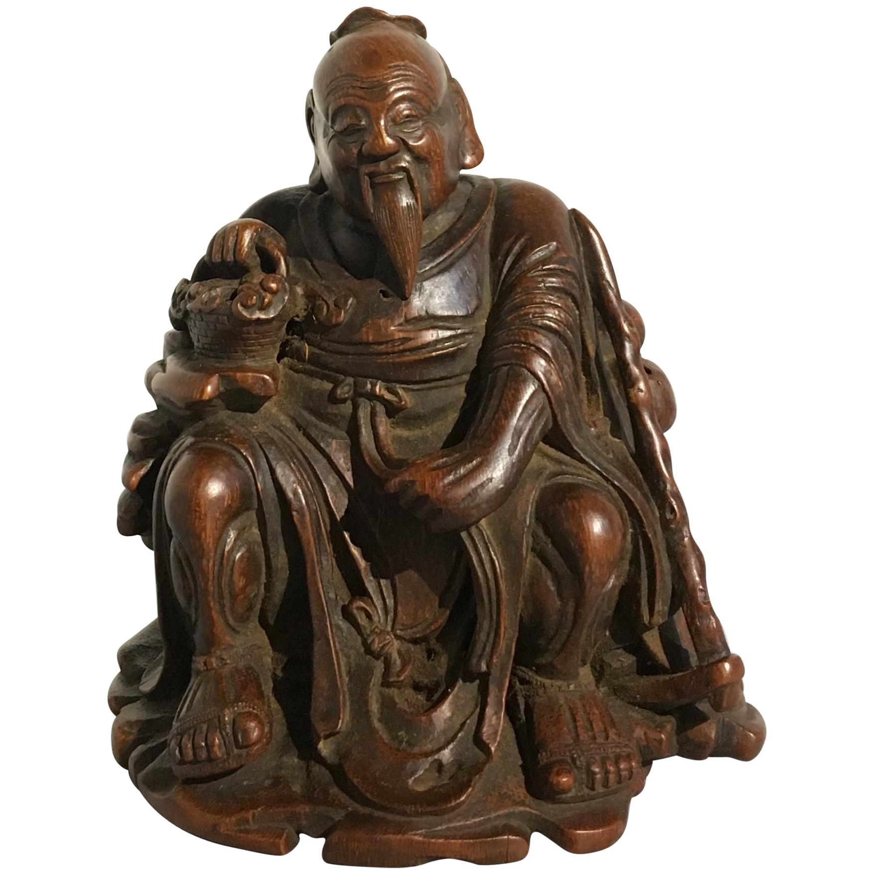 Figure d'un sage en bambou sculpté, dynastie Qing, 18e siècle