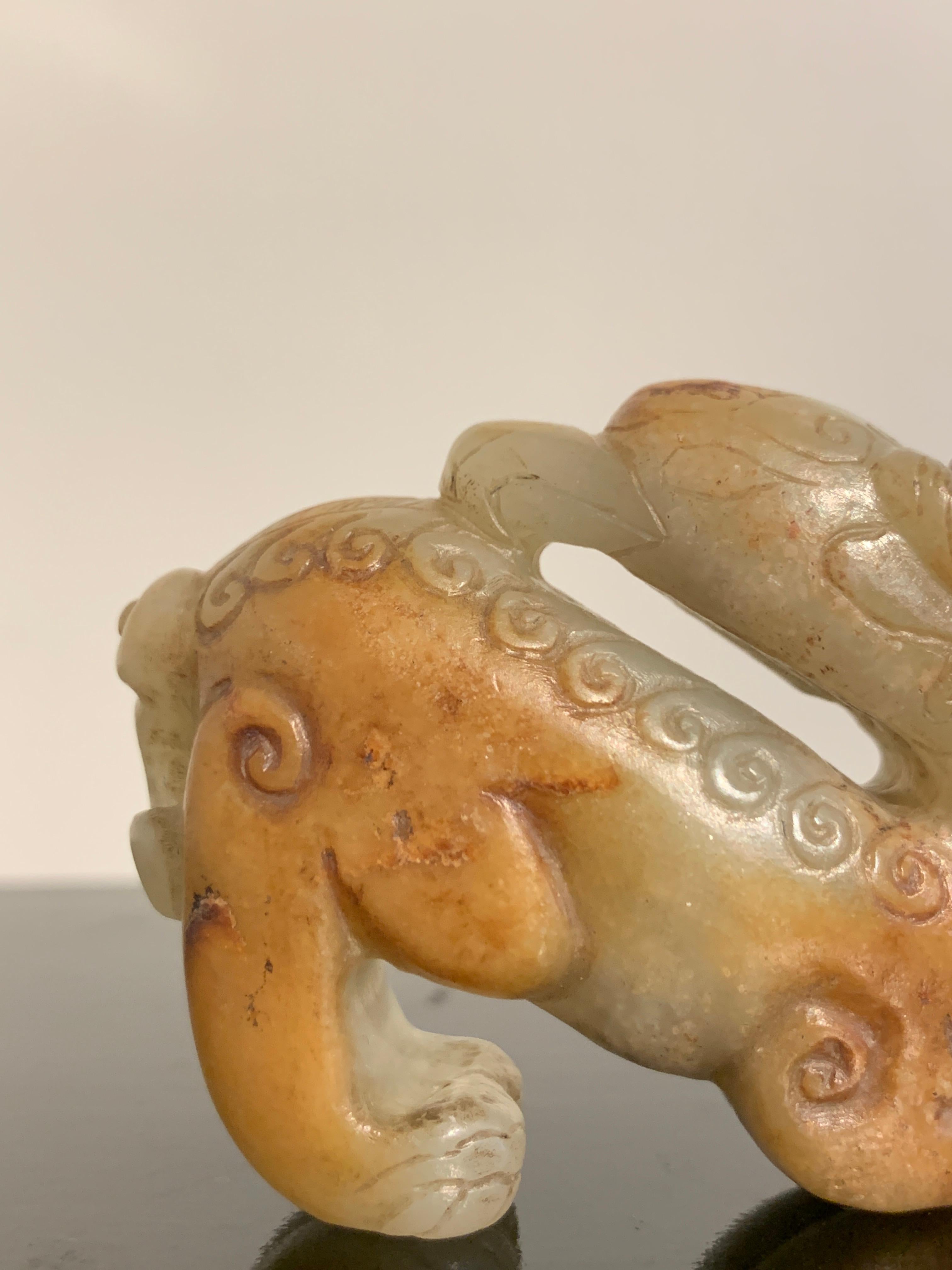 Chinese Carved Celadon and Russet Jade Mythical Animal, Ming Dynasty or Earlier For Sale 3