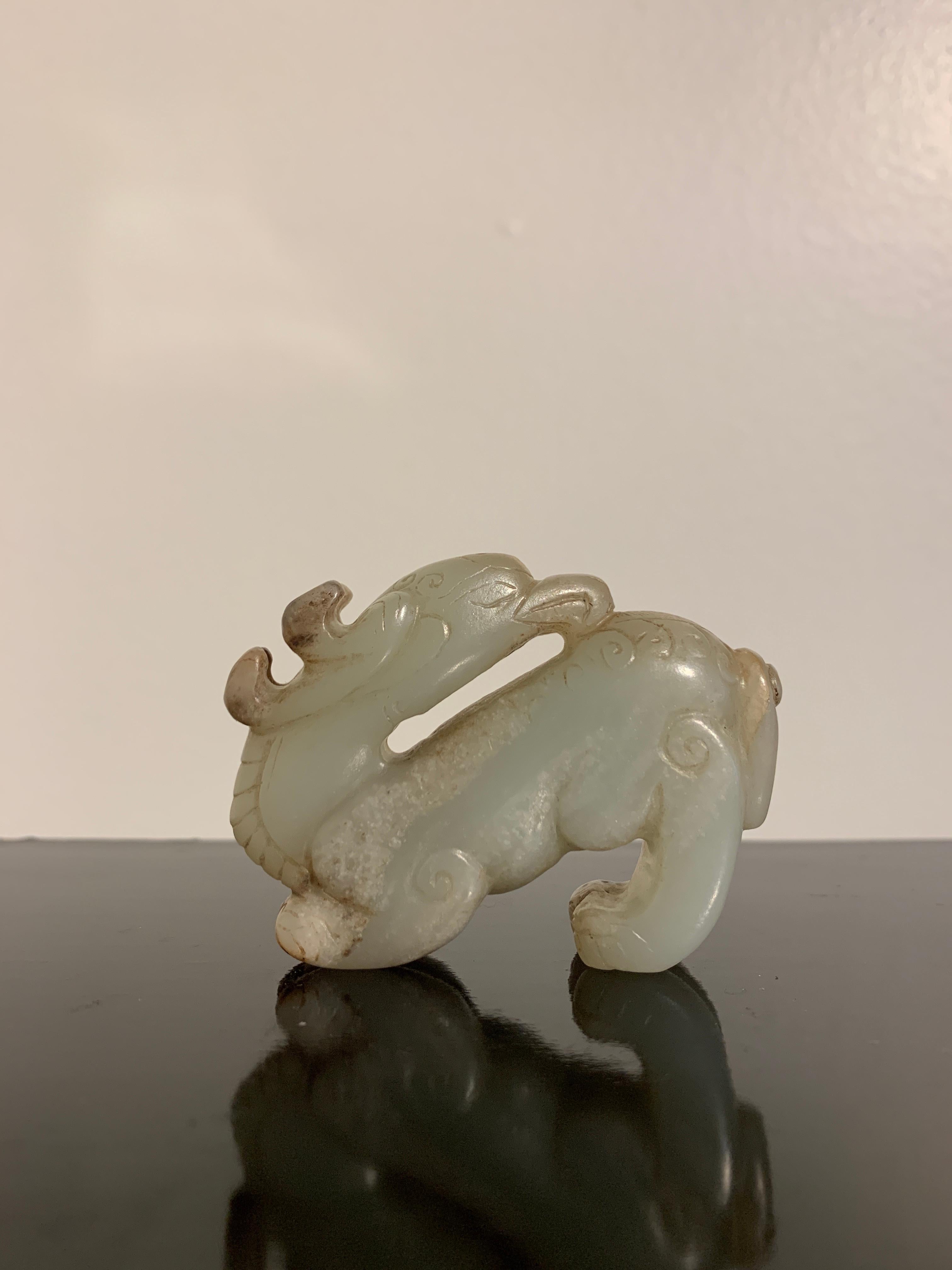 Chinese Carved Celadon and Russet Jade Mythical Animal, Ming Dynasty or ...