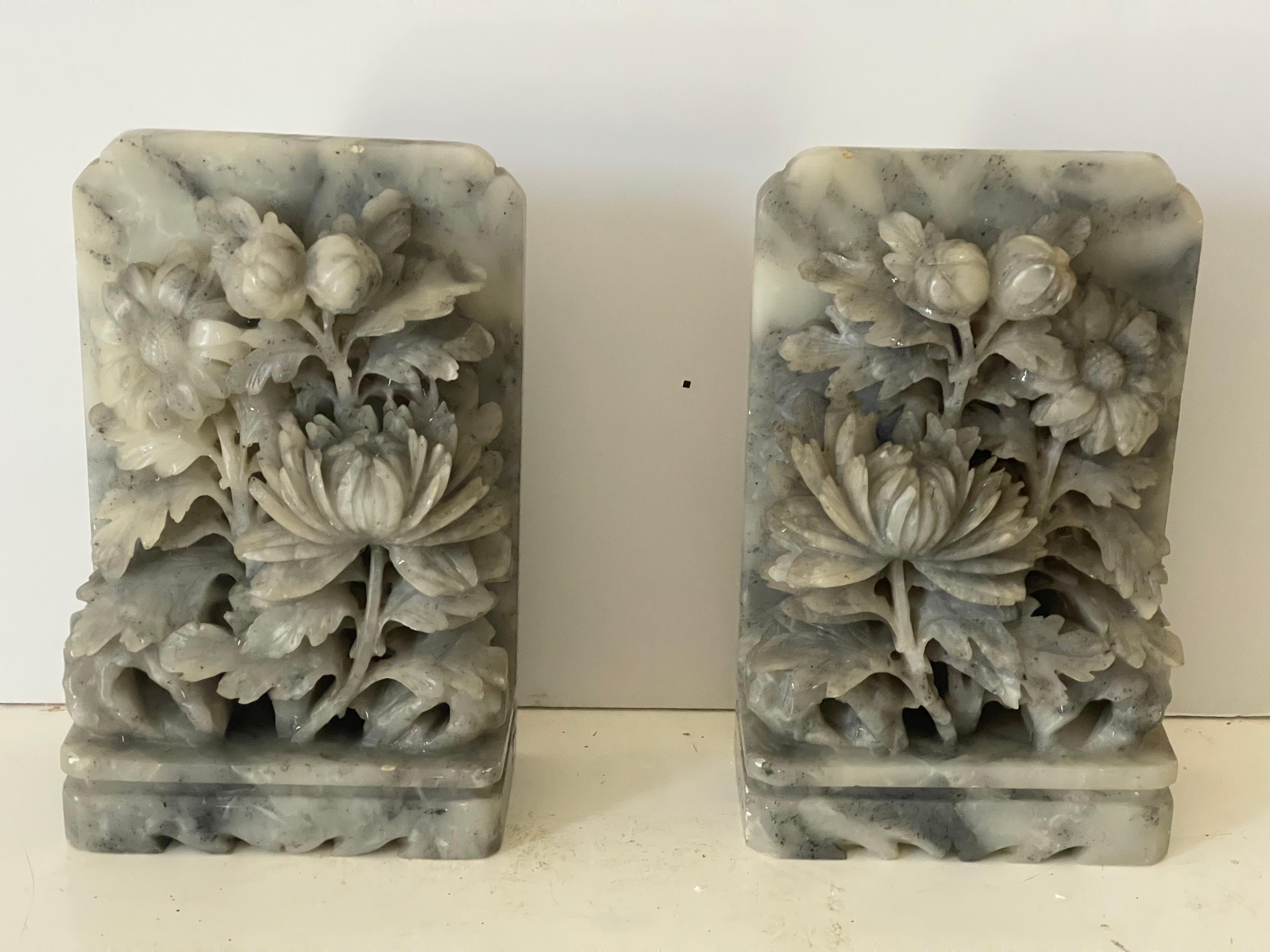 Splendid pair of antique Chinese bookends with handcarved chrysanthemum flowers. Gray hardstone or marble. From a Florida private collection.