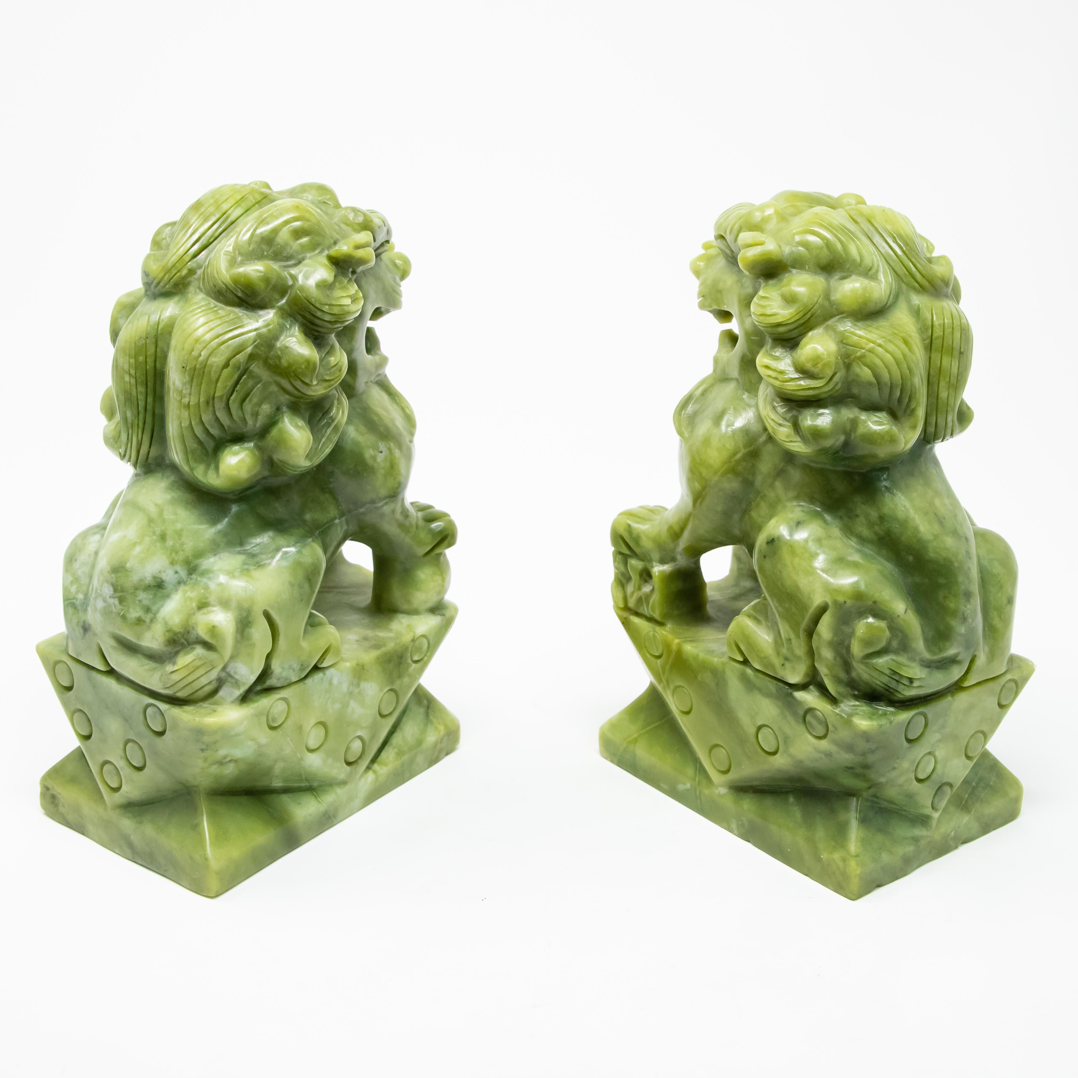 Hand-Carved Chinese Carved Serpentine Stone Guardian Lions For Sale