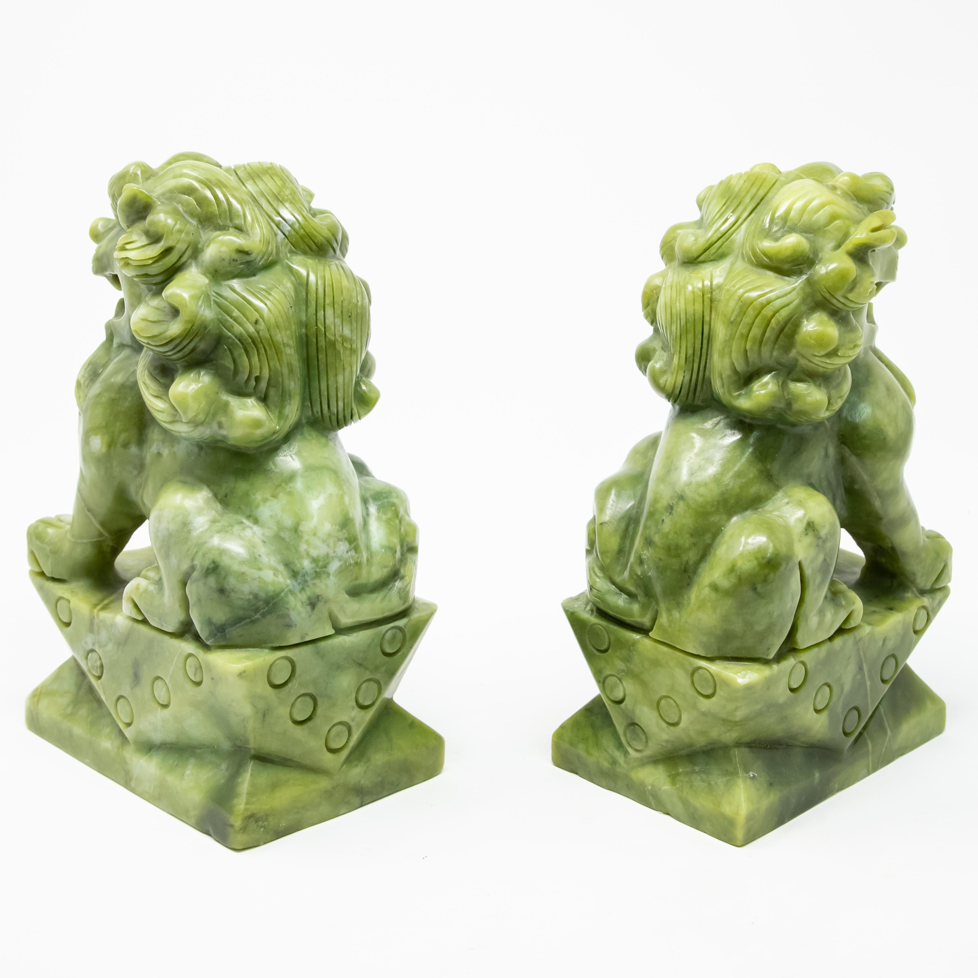 20th Century Chinese Carved Serpentine Stone Guardian Lions For Sale