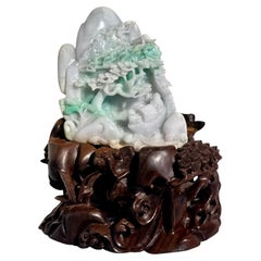 Chinese Carved Jadeite Boulder Grotto on Hardwood Stand, 20th Century, China