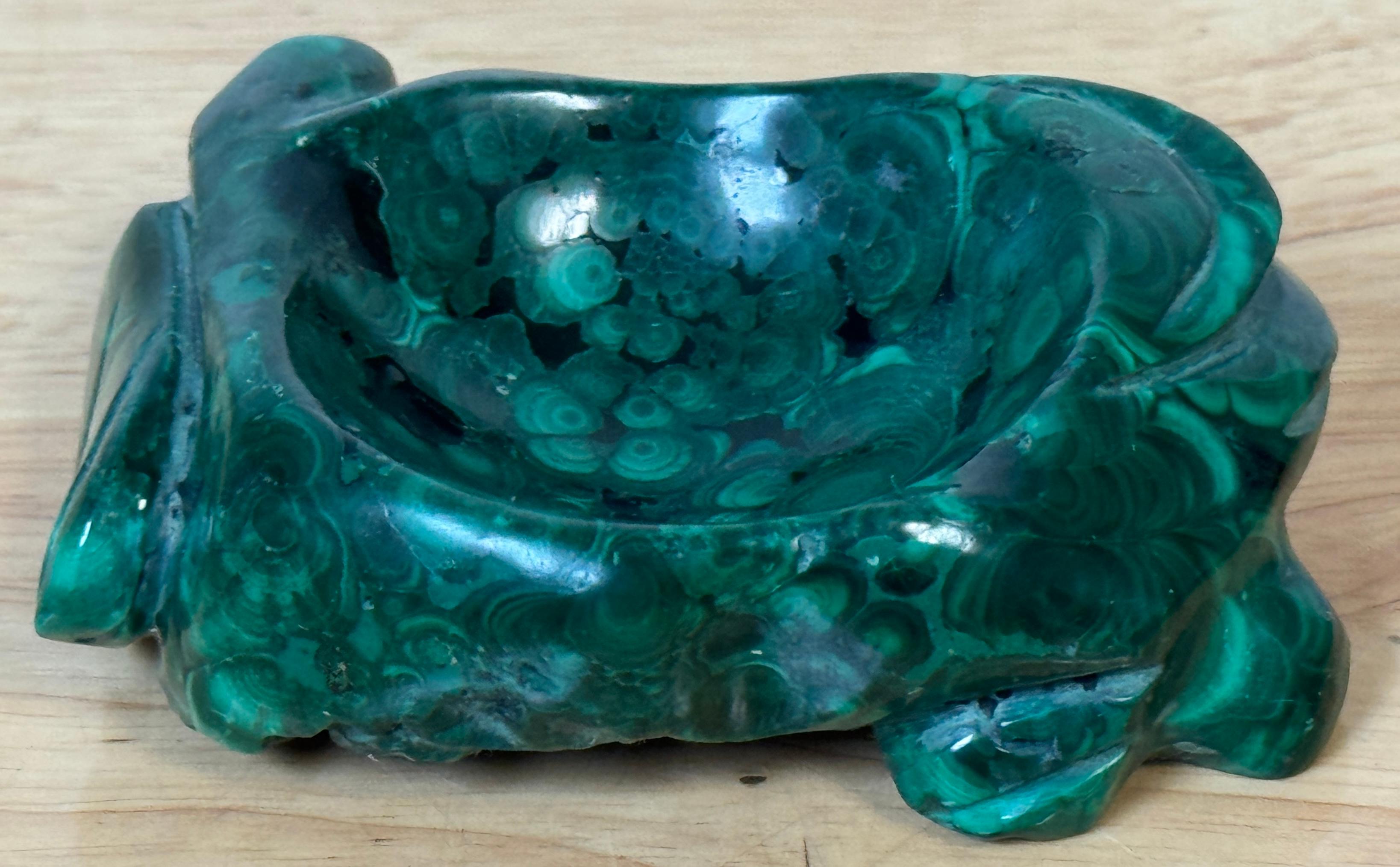 Chinese Carved Malachite Scholar’s Brush Washer in the Form of a Lotus Leaf, 20th Century

A finely hand-carved Chinese scholar’s brush washer, executed in richly banded natural malachite, dating to the 20th century. Carved from a single solid