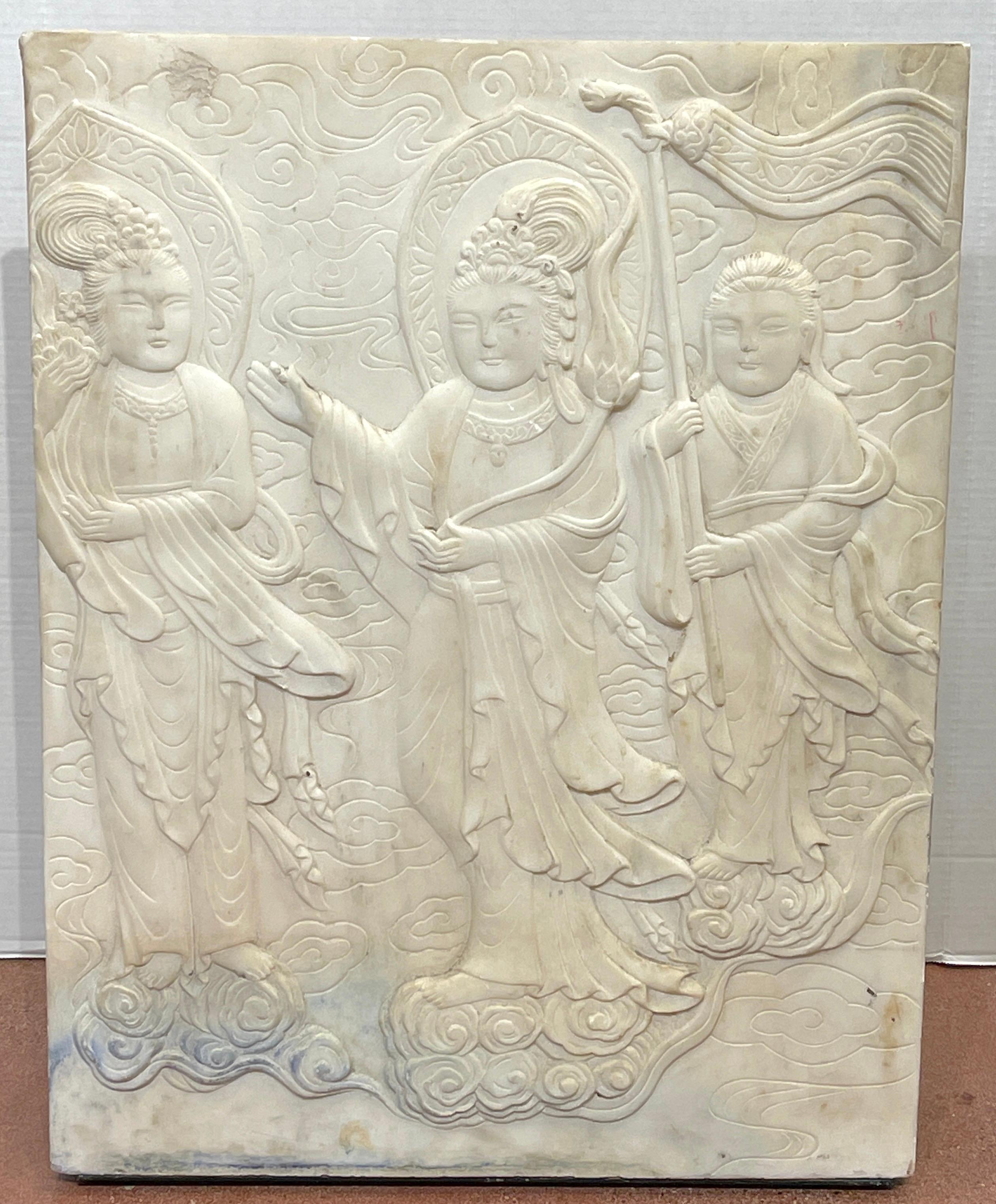 Chinese carved marble plaque of three deities
Carved in relief, with three figures floating in a cloud landscape
Complete with wrought iron display stand
Marble plaque measures 21-inches wide x 27-inches high x 1-inch thick
The wrought iron