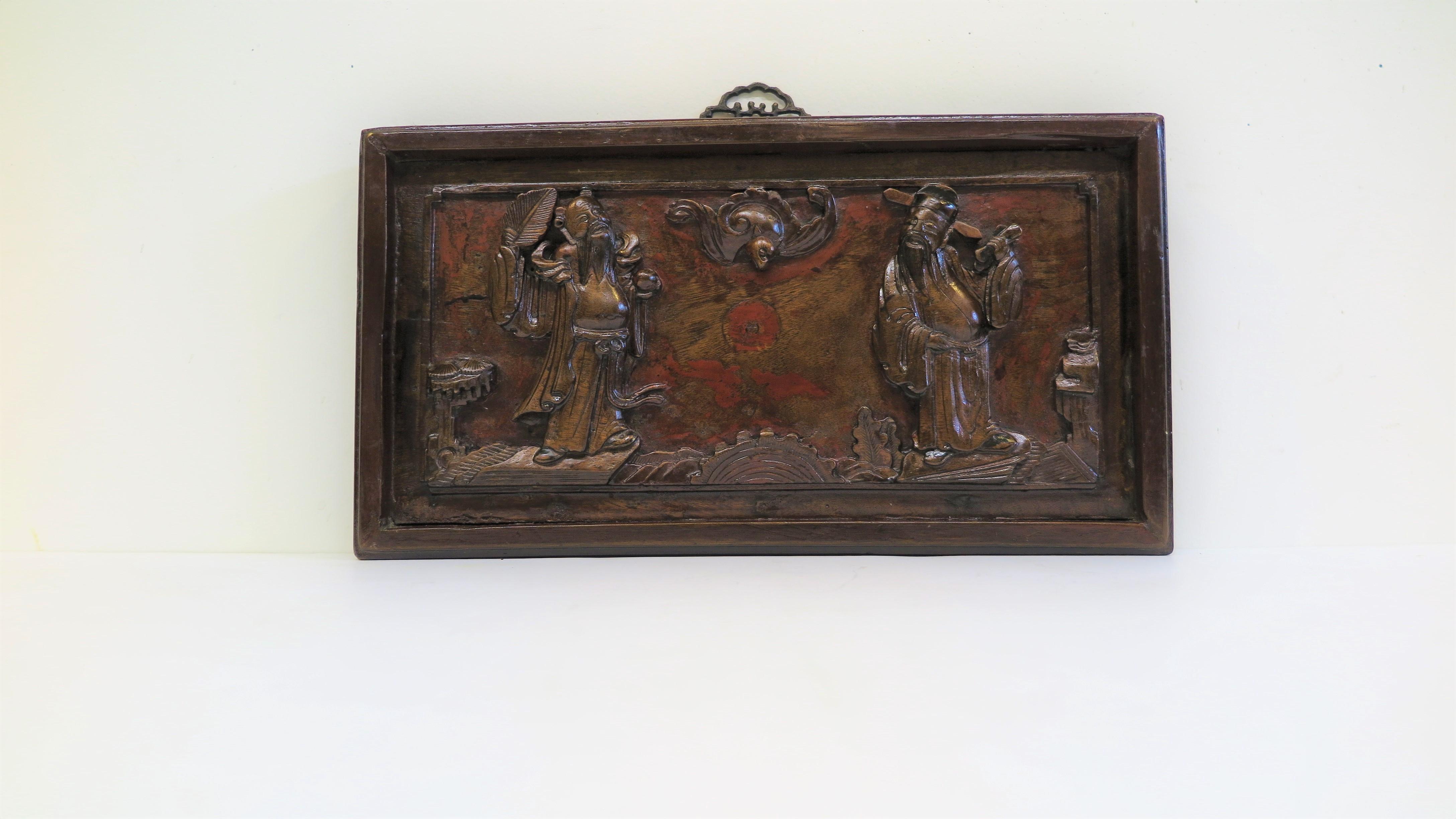 19th century auspicious carved panel story board. Chinese carved wooden panel of one solid piece of carved wood set in a wooden frame. A Chinese carved wooden panel telling an Auspicious story. To the center of the relief carving bottom are the sun