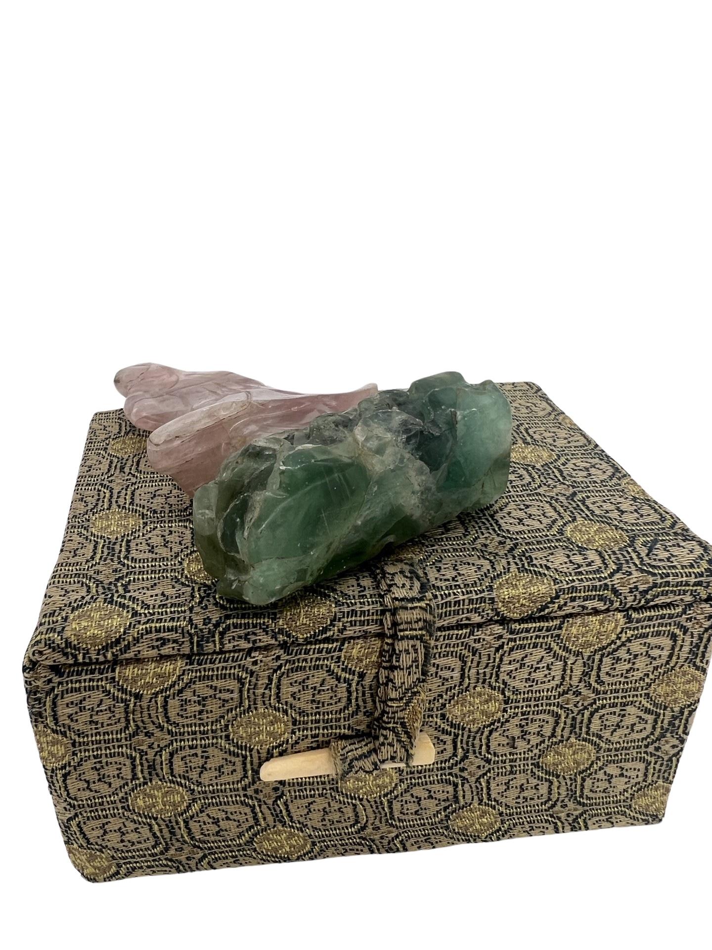 An immortal figure carved from rose quartz with a jade or nephrite base. Comes in export box. Unmarked. 
Approx: 3.375