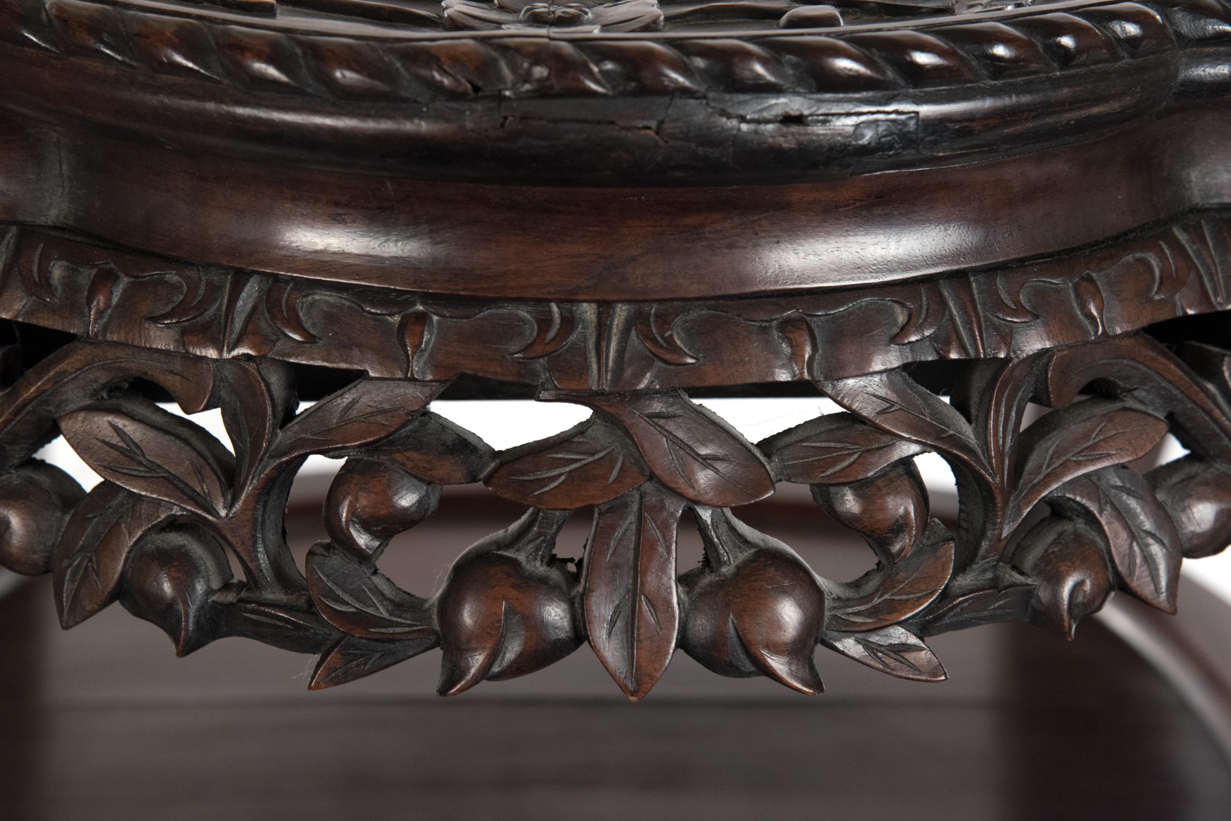 carved rosewood table