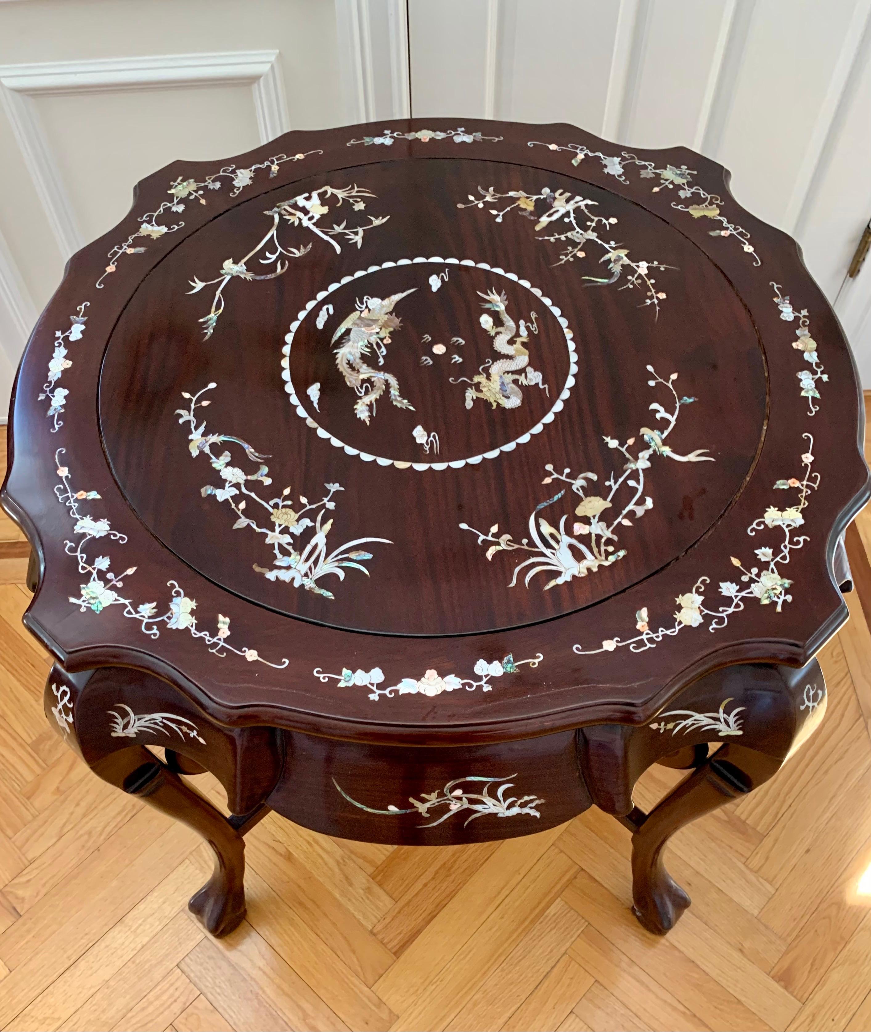 Chinese Carved Rosewood and Mother-of-Pearl Set, Tea Table and Four Stools 1