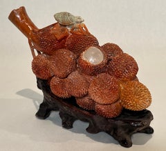 Ramo di frutta di litchi cinese intagliato in pietra ollare