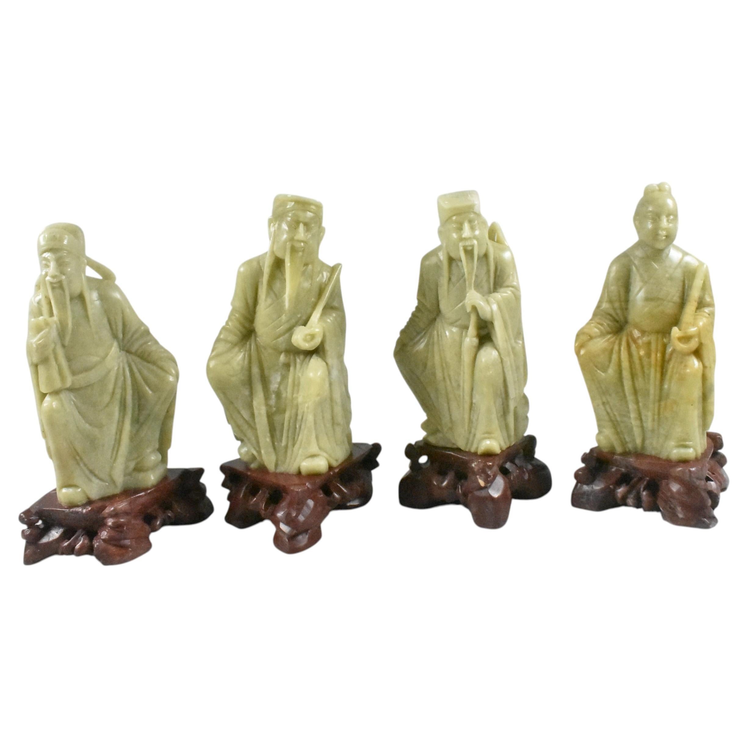 Set di 4 scolapiedi cinesi in pietra ollare intagliata