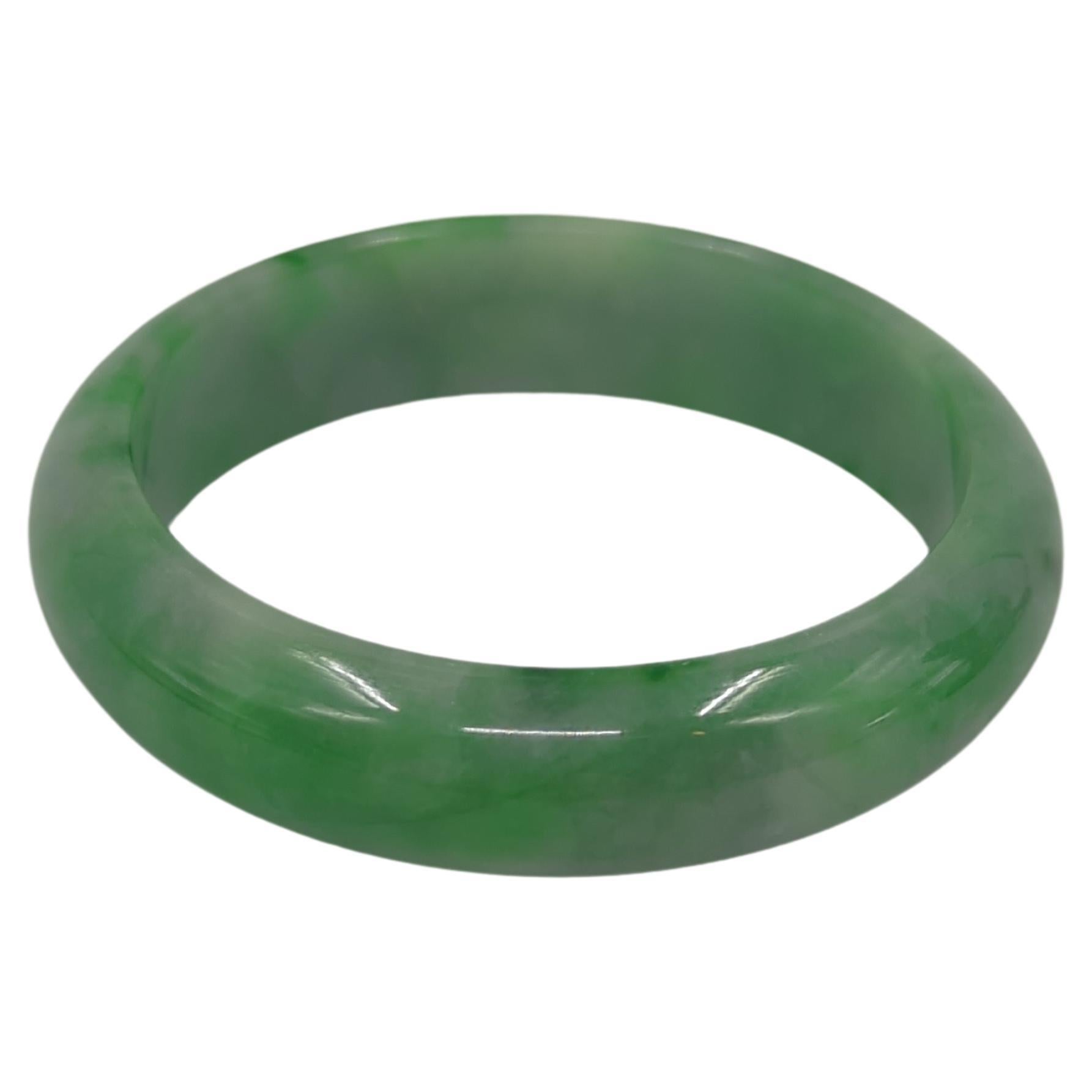 Round Cut Chinese Carved Translucent Mottled Emerald Green Spots Jadeite Bangle 57.5 mm ID For Sale
