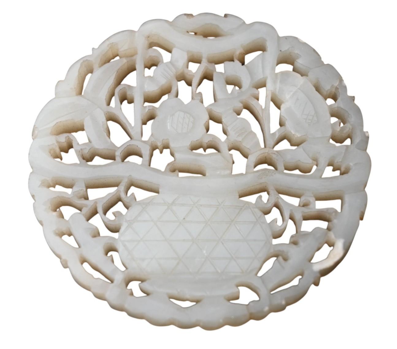 Jade Chinese Carved white jade disc with openwork decoration on a wooden base, Qing For Sale