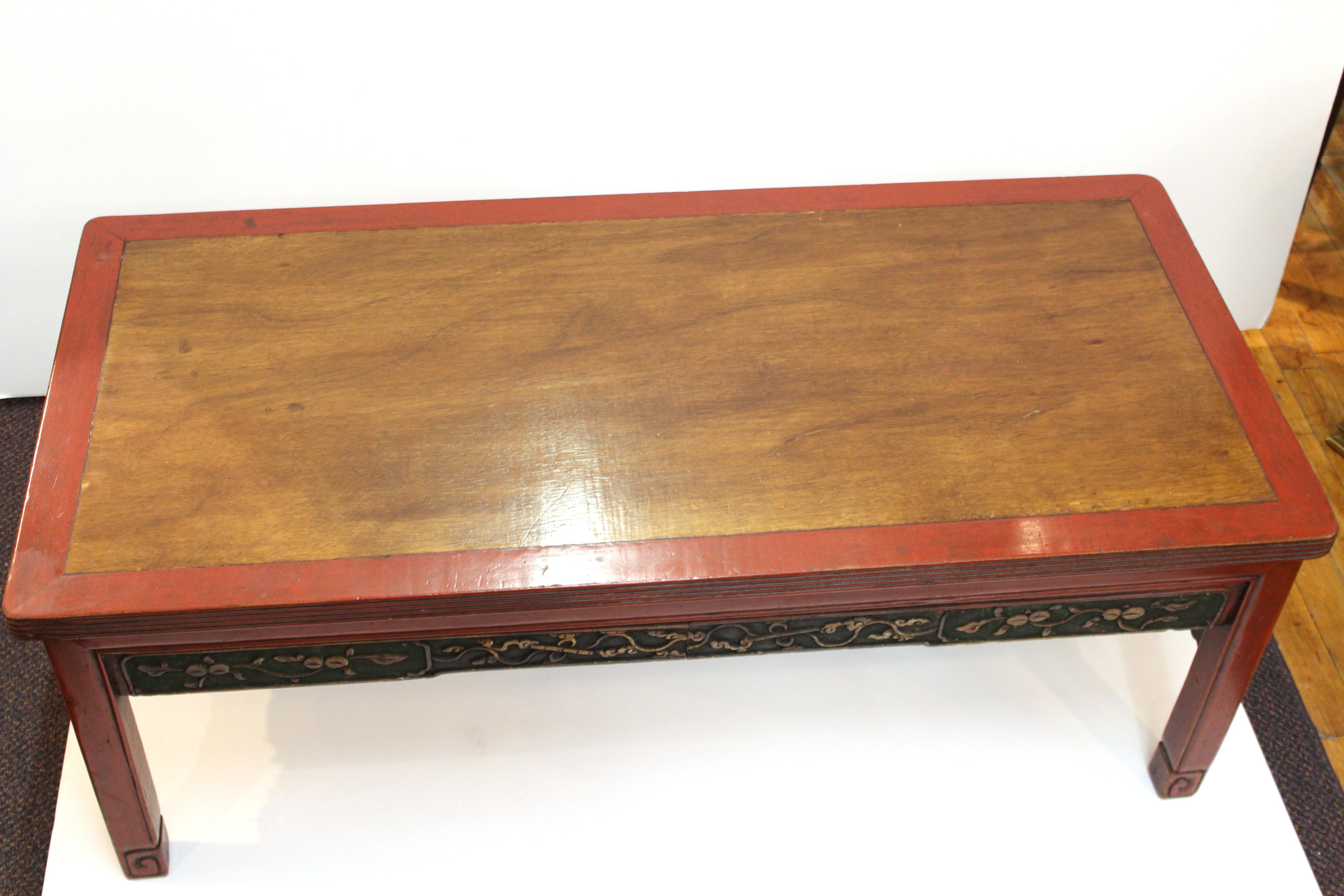 Chinese Carved Wood Cocktail Table in Red and Gold 1