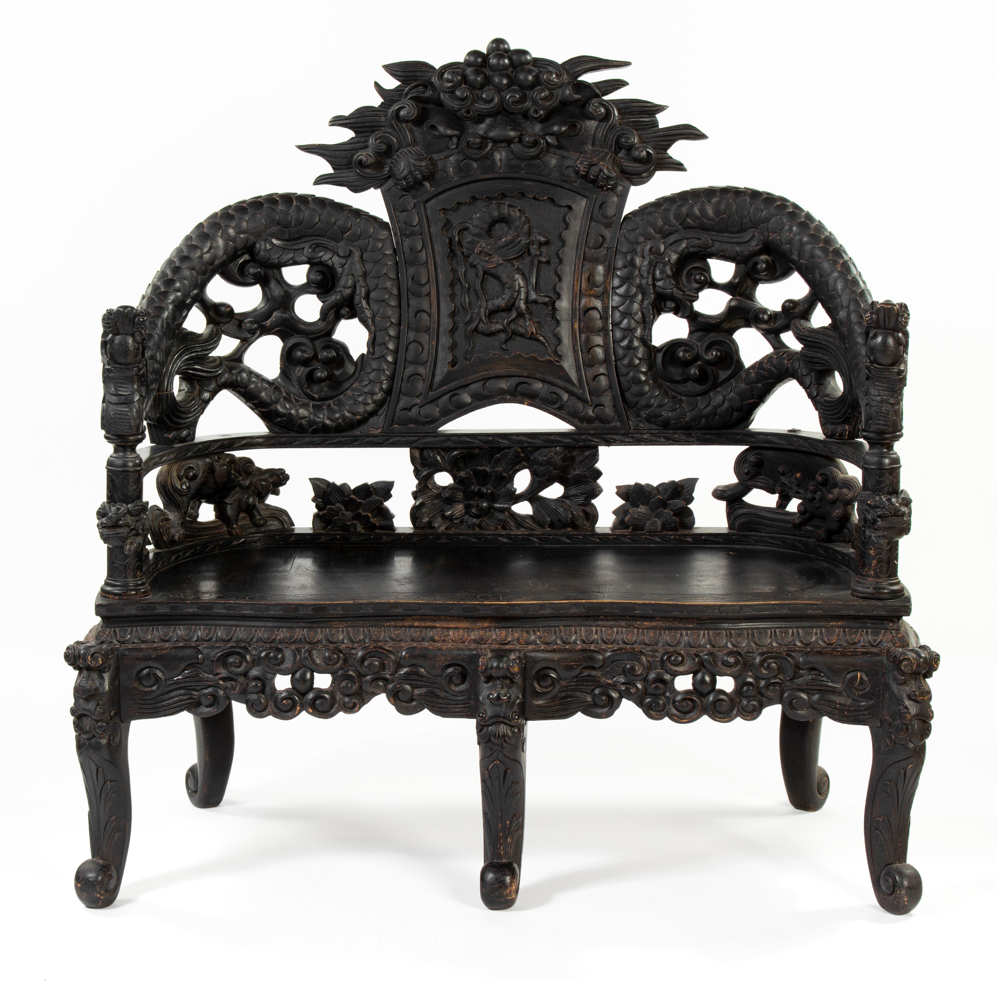 Chinese carved wood living room set, consisting of one table, two armchairs and one couch.

Table
Diameter: 60 cm
Height: 67 cm

Armchairs (2x)
Width: 66 cm
Depth: 60 cm
Height: 93 cm
Seat height: 48 cm

Couch
Width: 125 cm
Depth: 60