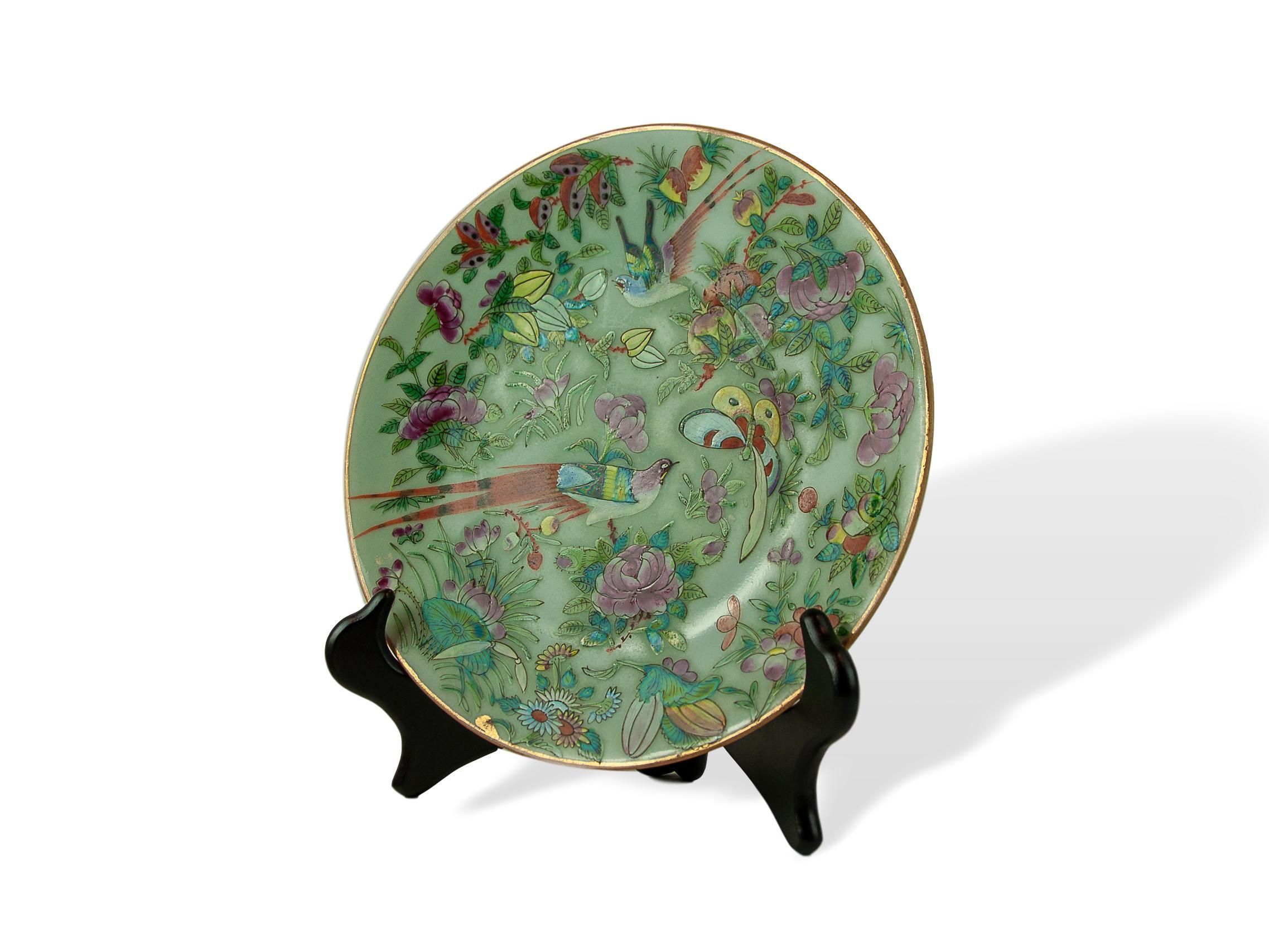 Chinese Celadon Famille rose 9.75 inch plate, Canton, circa 1820, enameled with stylized pheasants to center (rare configuration), floral and fruit sprays, reserved on a celadon ground. Underglaze-blue seal mark.