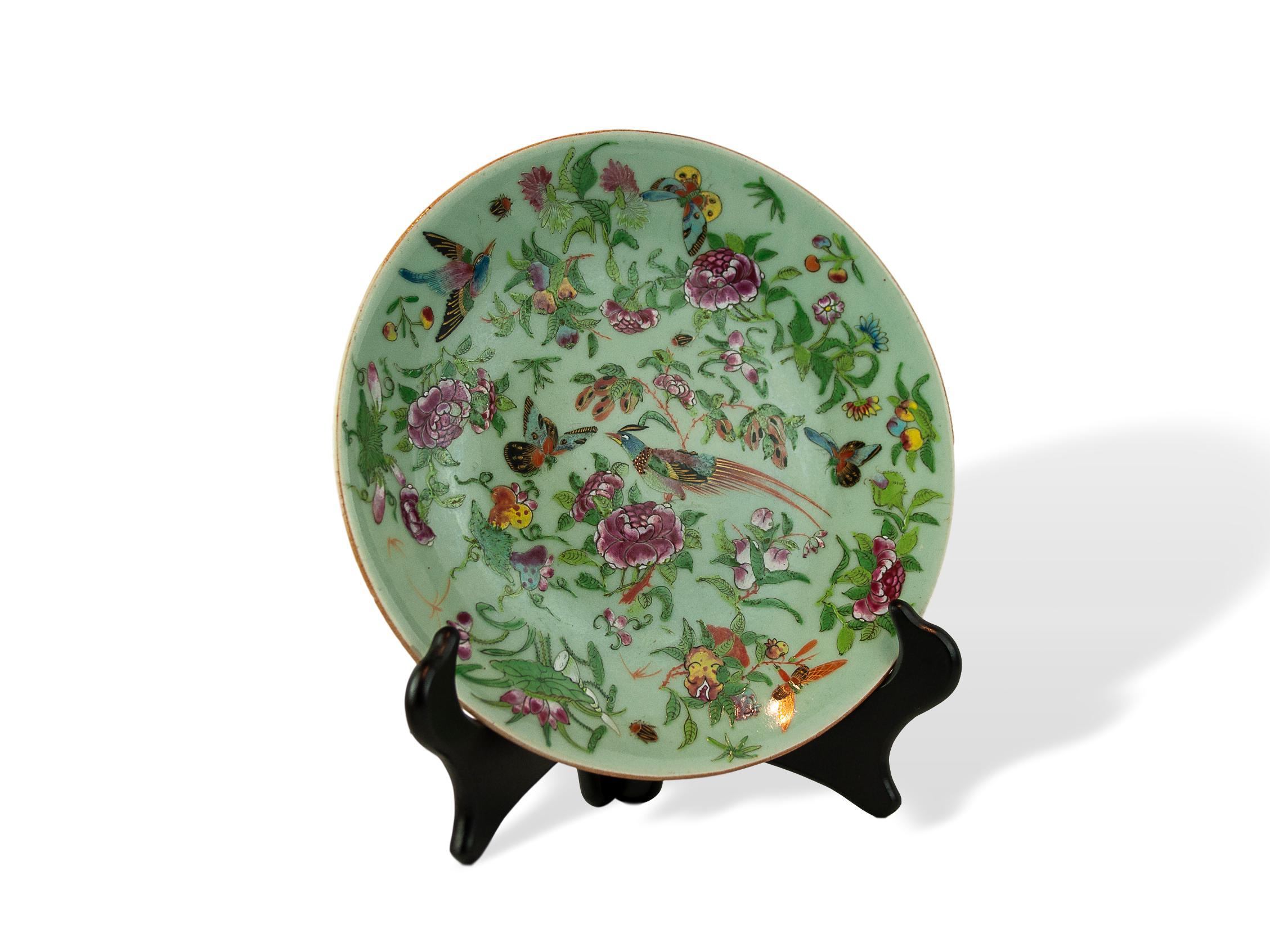 Chinese Celadon Famille Rose 9.75 inch plate, Canton, circa 1850, enameled with stylized pheasants, floral and fruit sprays, crickets and a single gilded dragonfly (rare), reserved on a celadon ground. Underglaze blue seal mark. Exceptional color,