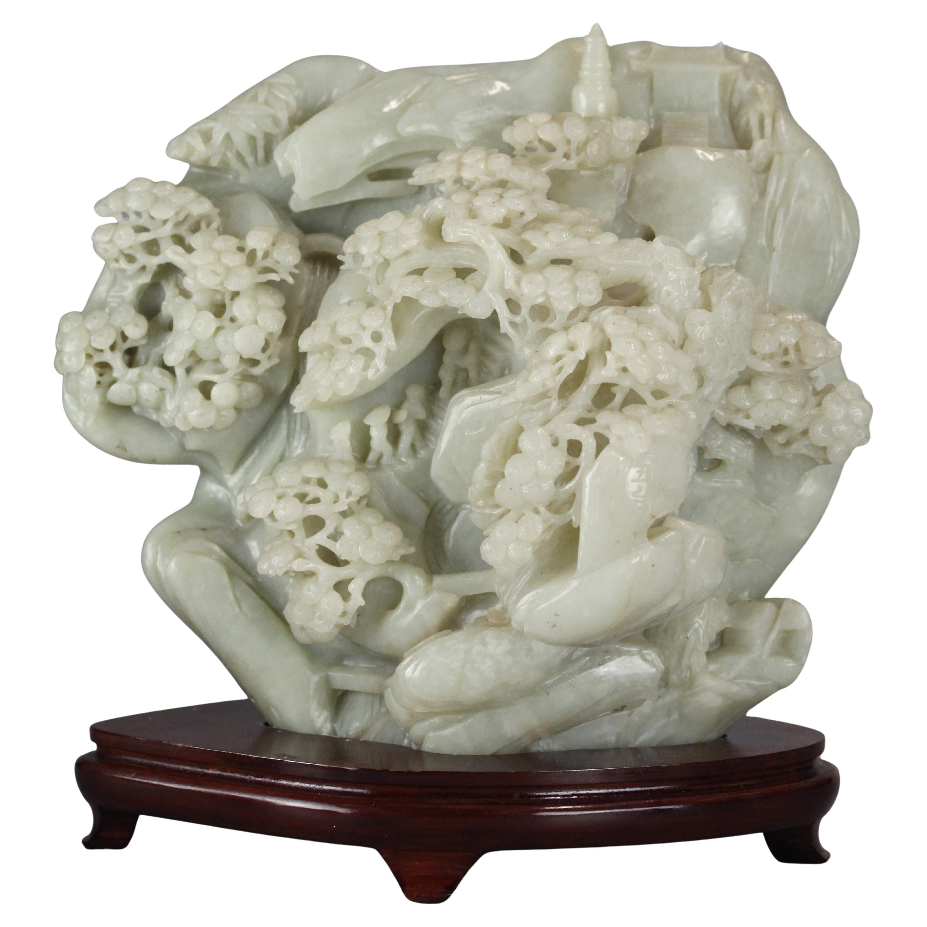 Scultura in giada celadon cinese raffigurante un paesaggio