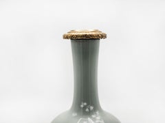 Chinese celadon porcelain vase with bronze