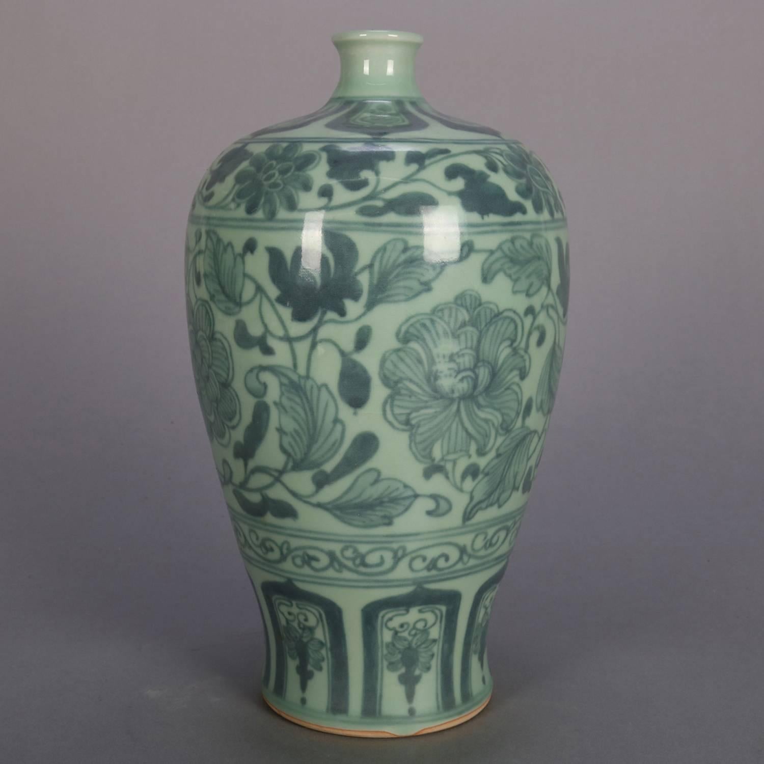 Chinese Celadon porcelain vase features allover floral and leaf decoration, 20th century

Measures: 11.5