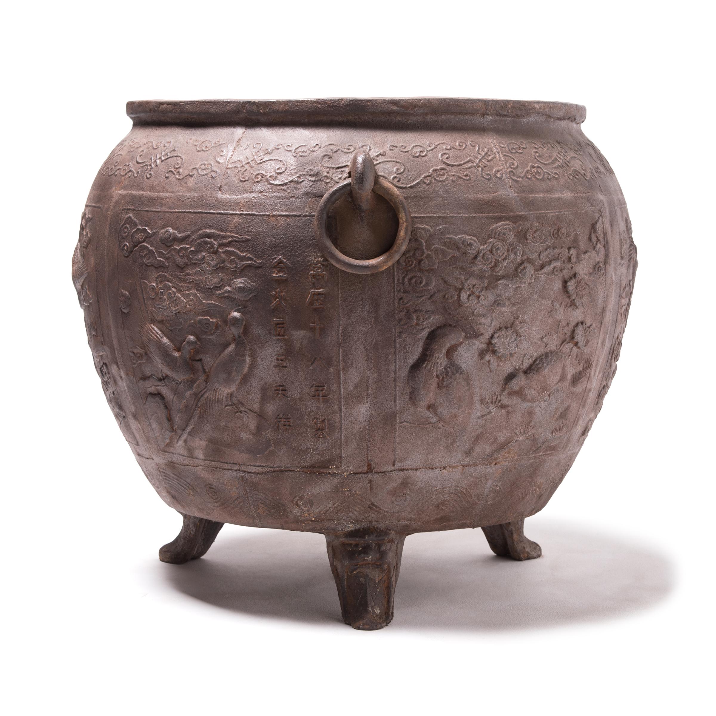 China was the earliest known civilization to create works using cast iron, first appearing during the illustrious Zhou dynasty (1046-256 BCE). This capacious vessel continues tradition and references 19th century iron vessels used for collecting