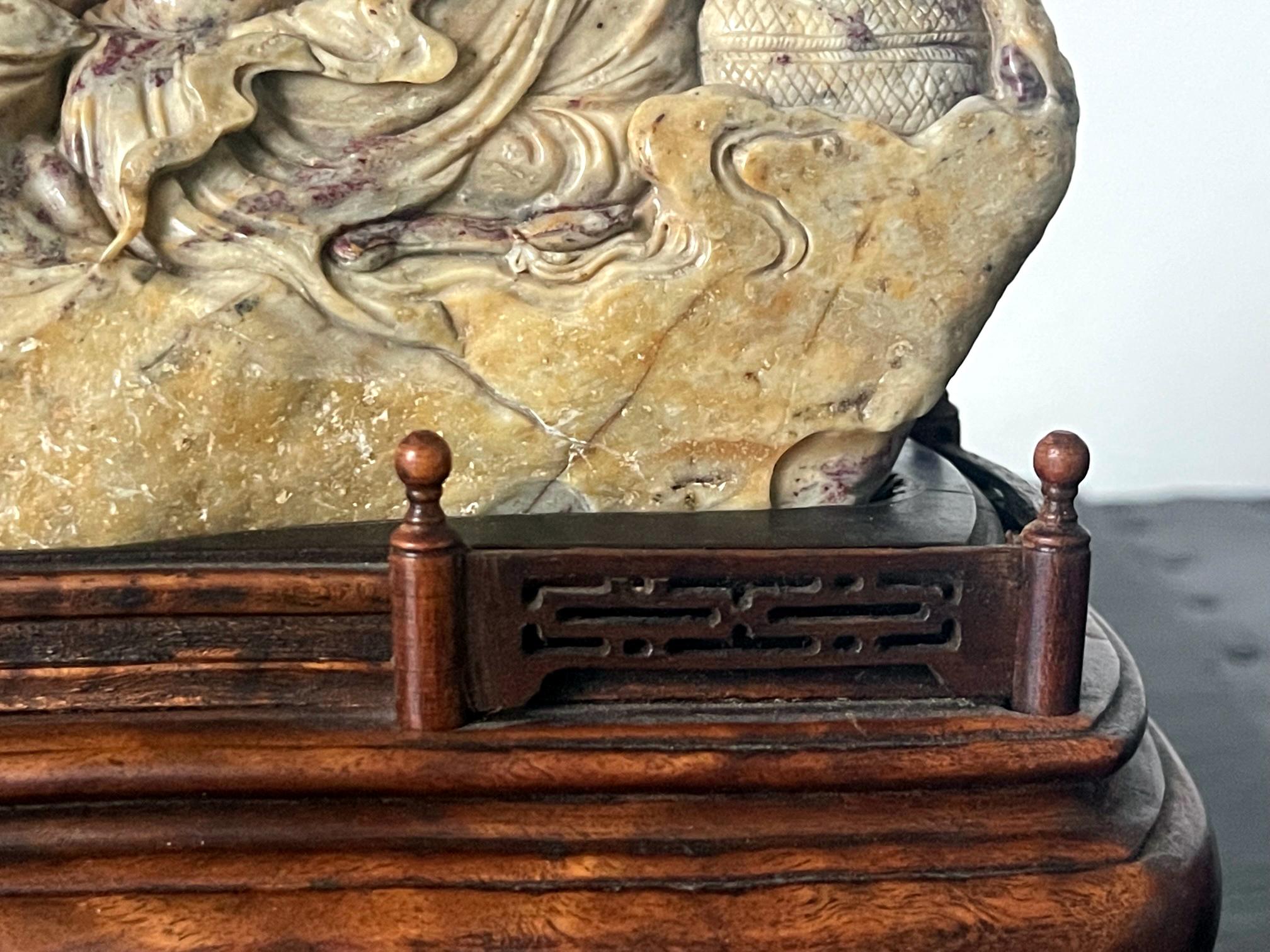Chinese Chicken Blood Stone Carving of Bodhidharma on Wood Stand For Sale 9