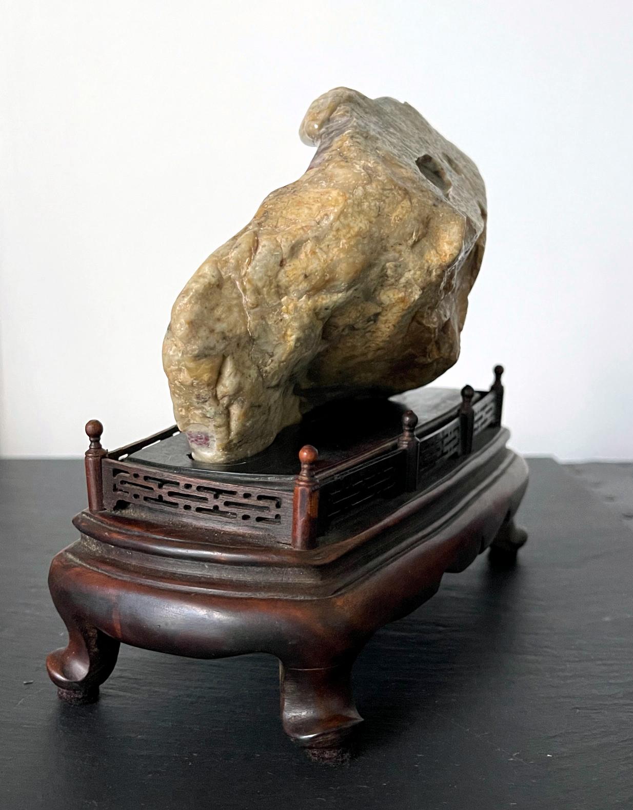 Chinese Chicken Blood Stone Carving of Bodhidharma on Wood Stand In Good Condition For Sale In Atlanta, GA