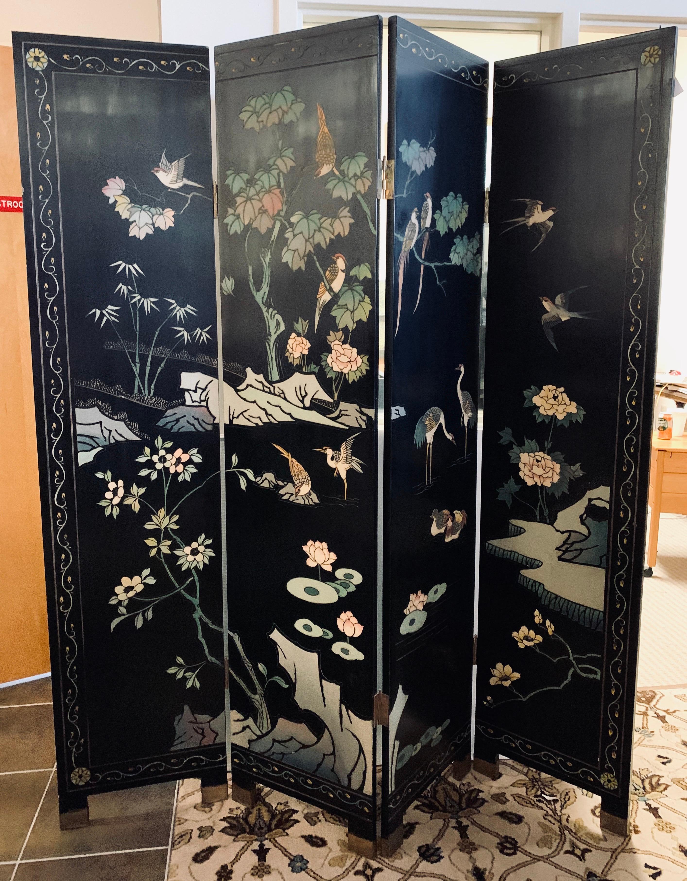 Elegant black lacquered four panel Chinese chinoiserie folding screen/room divider. These screens can be used to divide space but are also use hung directly on walls as art. The latter way looks magnificent.
Now, more than ever, home is where the