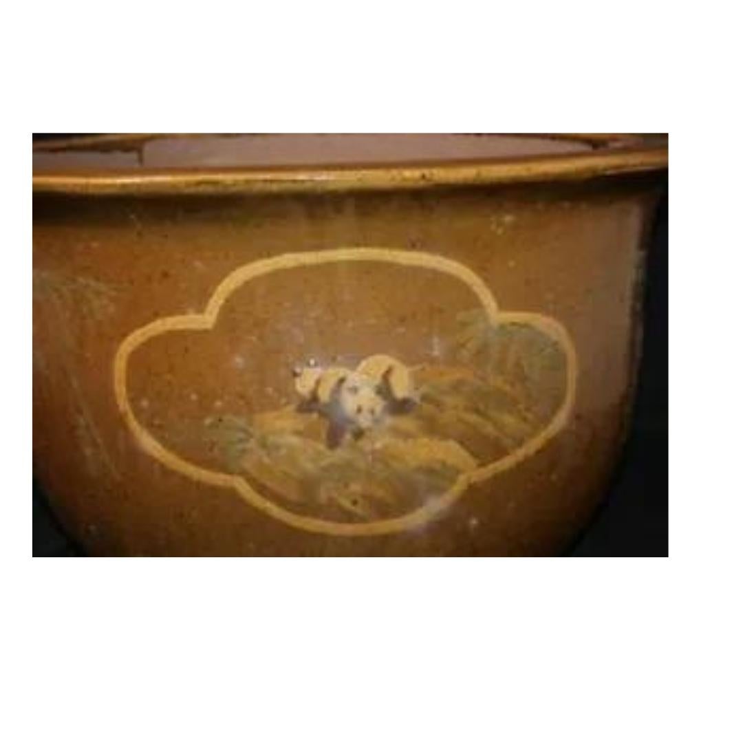 Chinese Chinoiserie Panda & Bamboo Pottery Jardiniere Garden Planter Flower Pot. Item featured is a large impressive size, nice glaze finish with raised textured decoration. Chinese symbols on the inside of the pot and a hole in the bottom for water