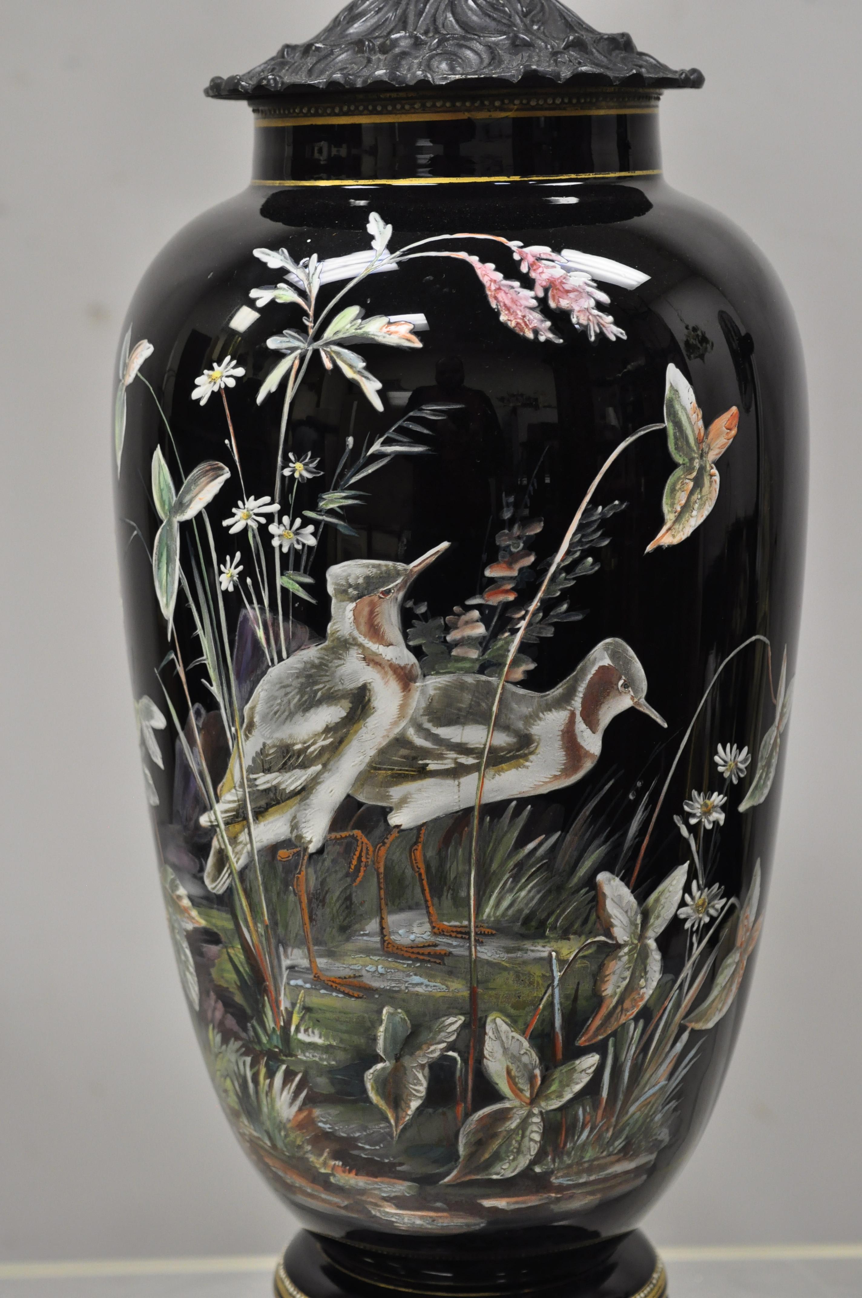 Antique Chinese chinoiserie porcelain ceramic black jardinière bird painted table lamp. Item features solid floral carved wood base, porcelain/ceramic body with hand painted scenes of birds and plants, very nice antique item, great style and form,