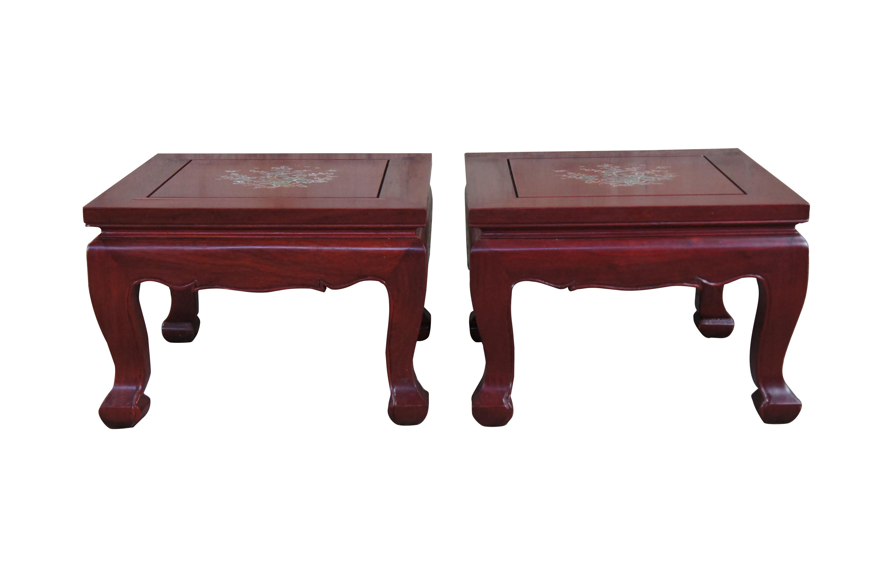 Pair of vintage Chinese Rosewood foot stools or low side tables featuring square form with inlaid MOP mother of pearl floral rose peacock and butterfly design supported by Chippendale style legs.  Great for use as plant stands or sculpture
