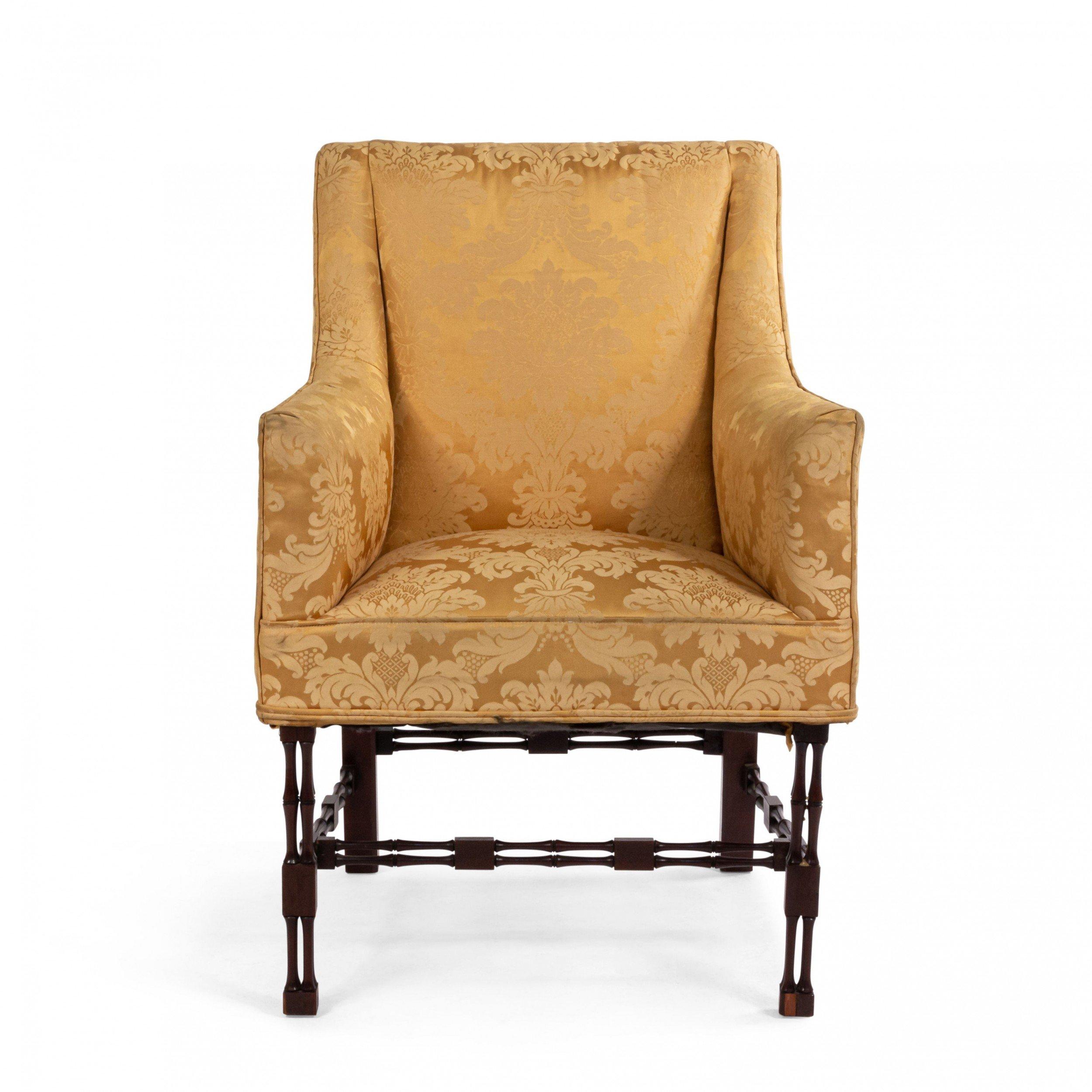 Pair of English Chinese Chippendale style (19th-20th Century) mahogany bergere arm chairs with cluster legs with stretcher and gold damask upholstery