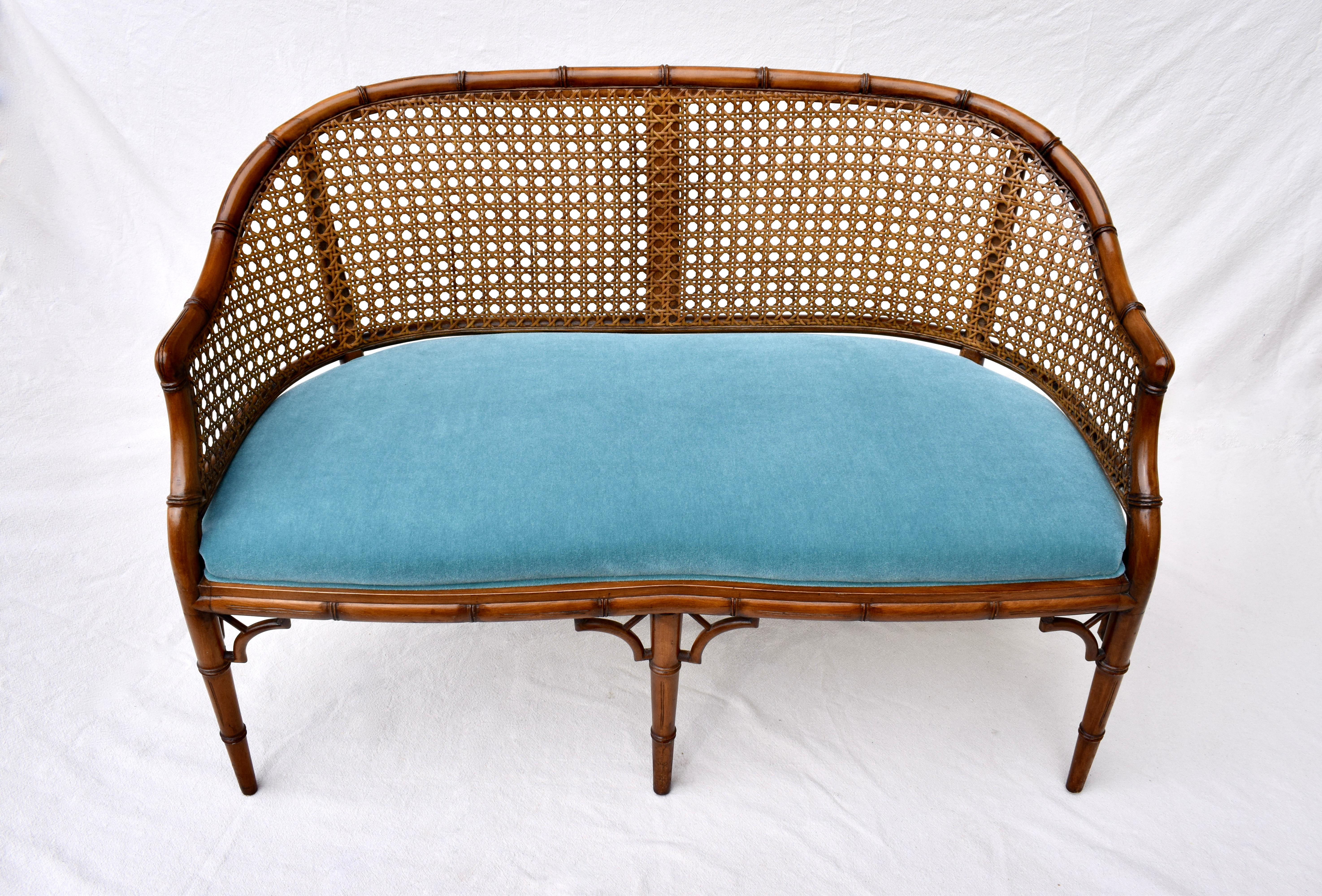 An exquisite Chinese Chippendale style Faux bamboo with caned barrel back settee loveseat newly upholstered in plush Teal Mohair. Circa 1980's.
 