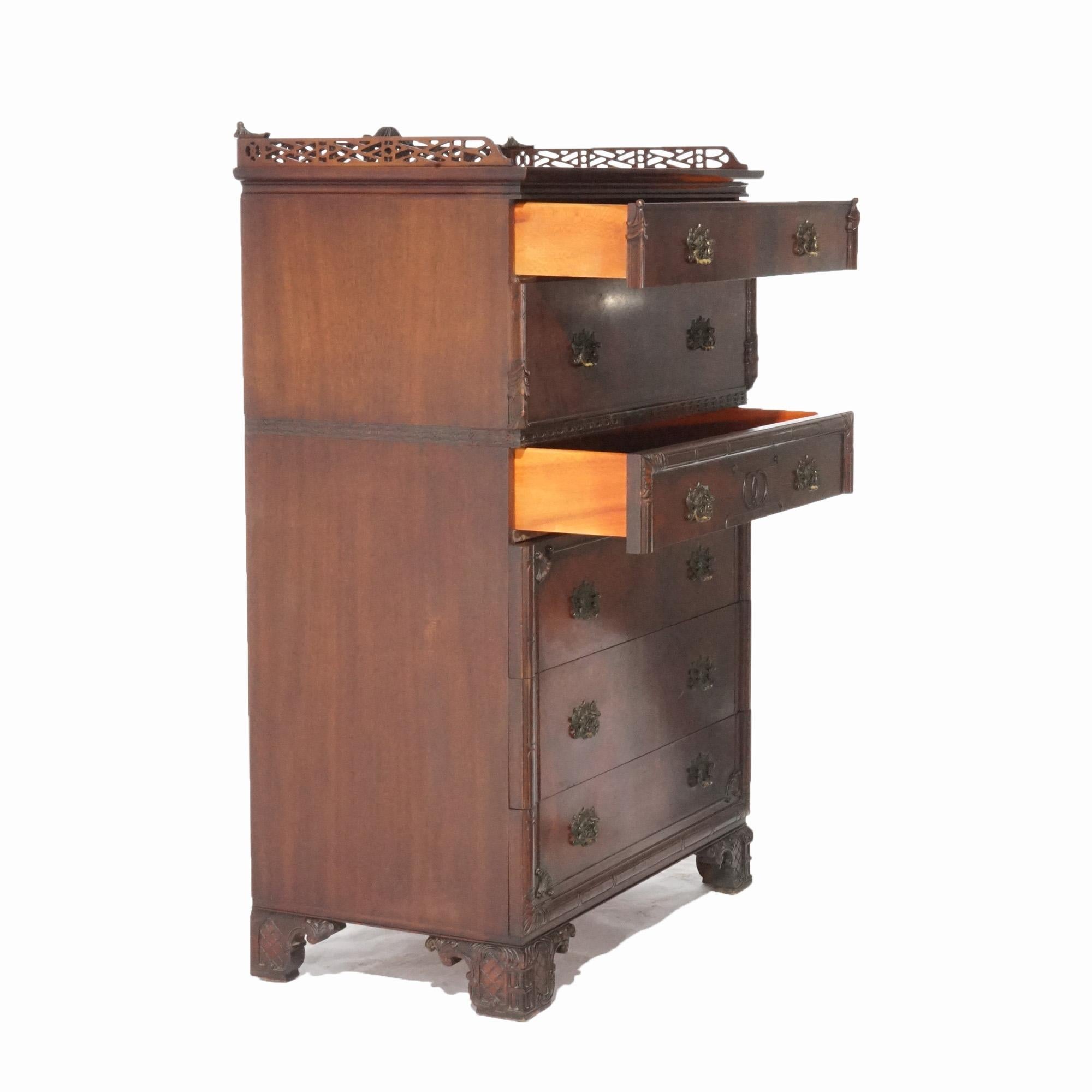 A Chinese Chippendale high chest offers flame mahogany construction with upper pierced rail over case having six long drawers, raised on stylized bracket feet, circa 1940

Measures- 56''H x 36.5''W x 21''D

Catalogue Note: Ask about DISCOUNTED