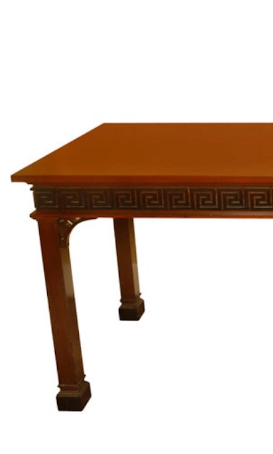 A Chinese Chippendale English mahogany console with fret carved frieze in Greek key design. Beautiful hall table.