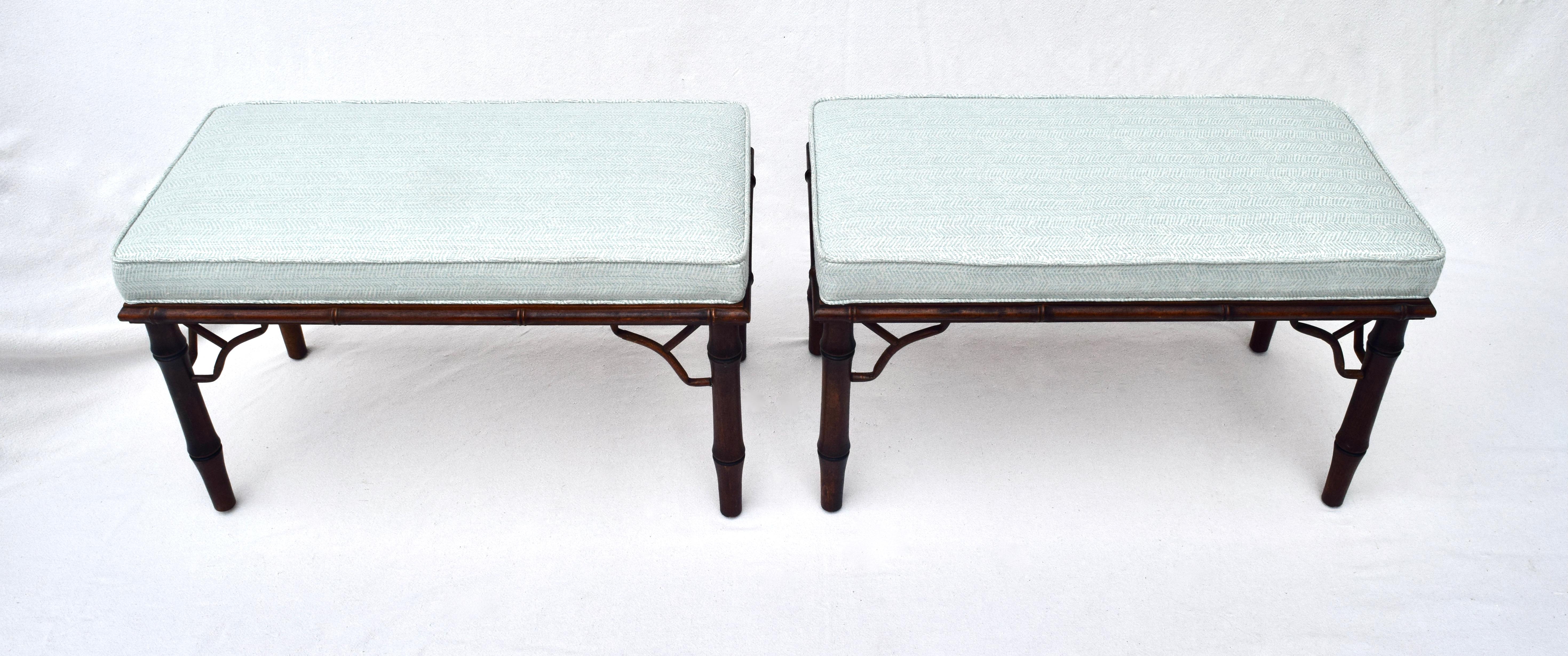 A pair of mahogany Chinese chippendale faux bamboo benches of generous proportions with new custom cushions upholstered in blue & white William Yeoward Herringbone Fabric.