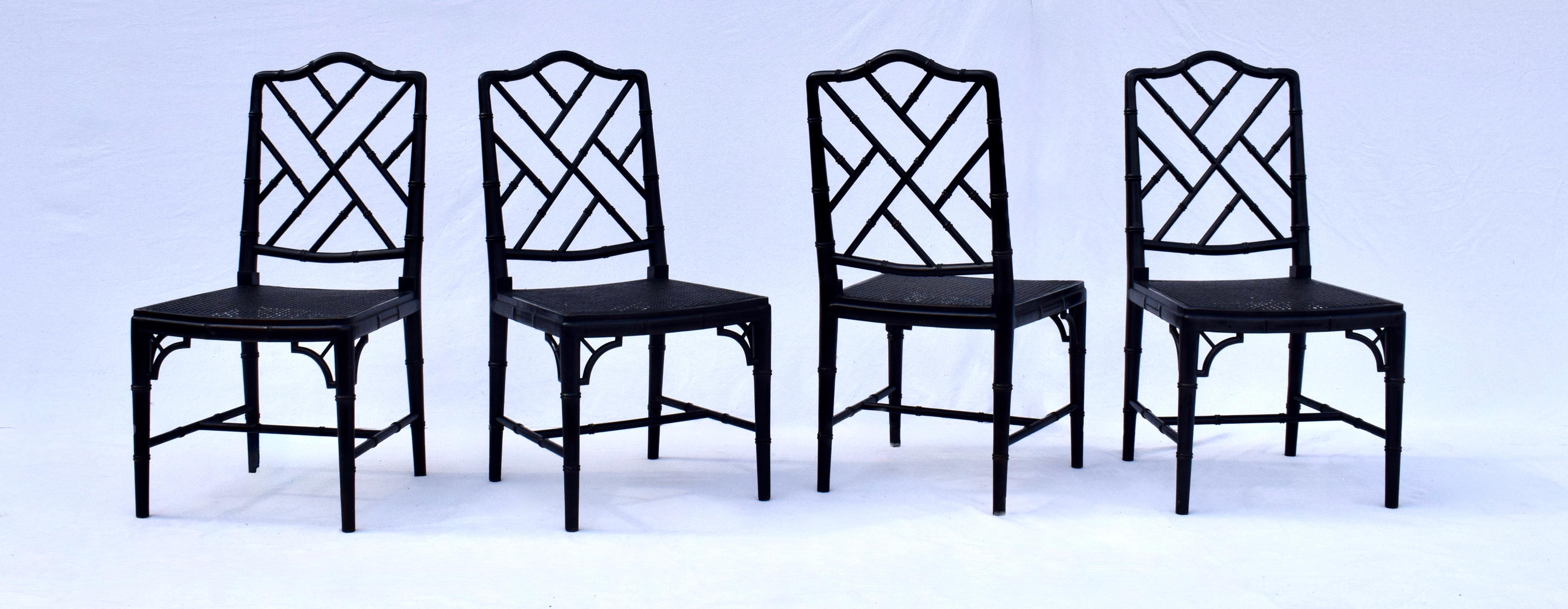 A set of eight vintage Chinese Chippendale faux bamboo cane dining chairs with hand oiled & rubbed ebonized wood frames, cane seats in exceptionally well maintained, rarely used condition. Ready for use. Seats: 16.5