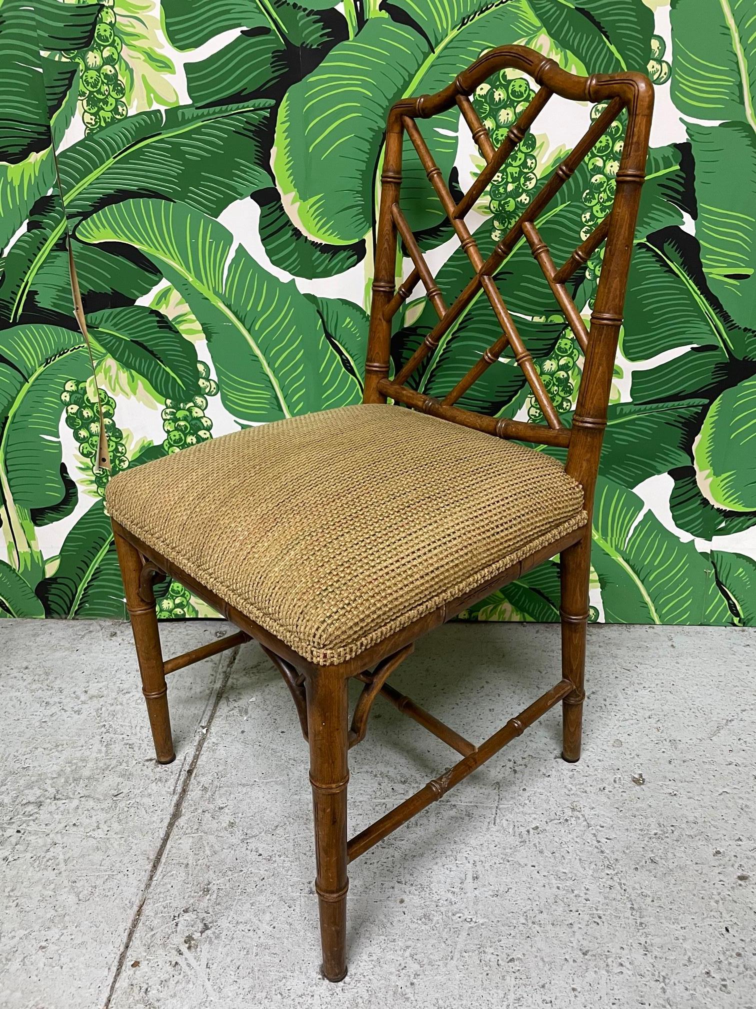 Set of six faux bamboo dining chairs in chinoiserie style by Century Chair Company. Deep brown stained finish with neutral upholstery. Very good condition with only very minor imperfections consistent with age.