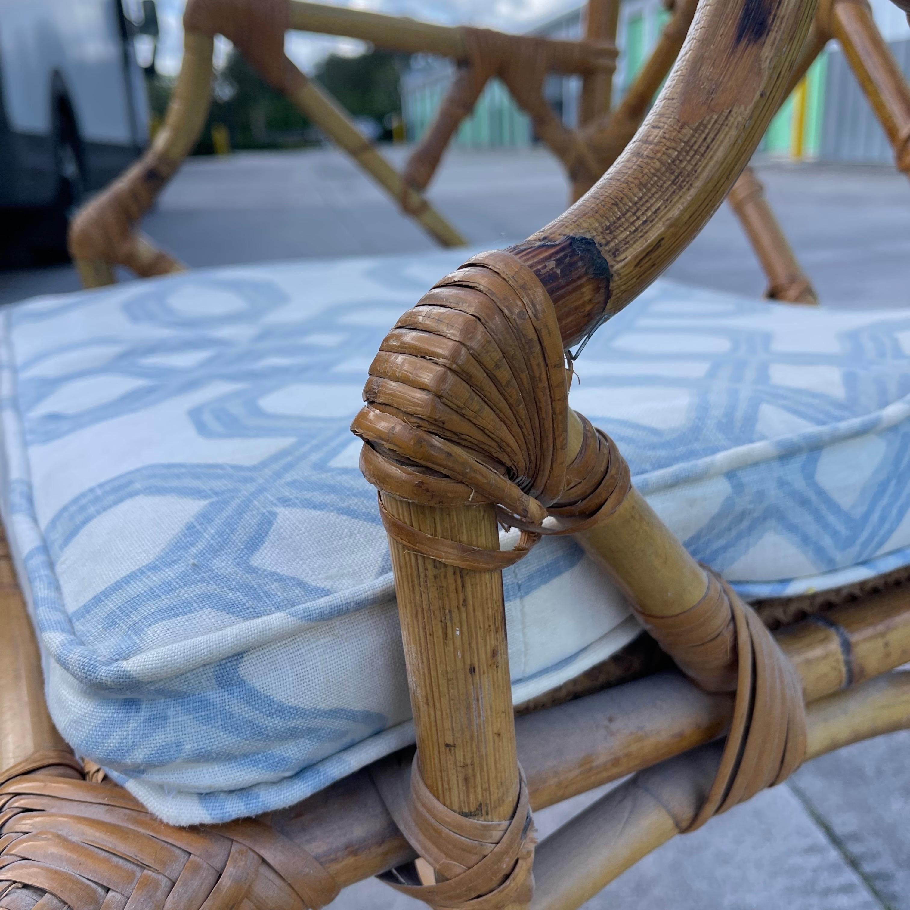 Charming bamboo chair in a classic Chippendale fretwork style. Cane seat. 

Seat height without cushion: 18”