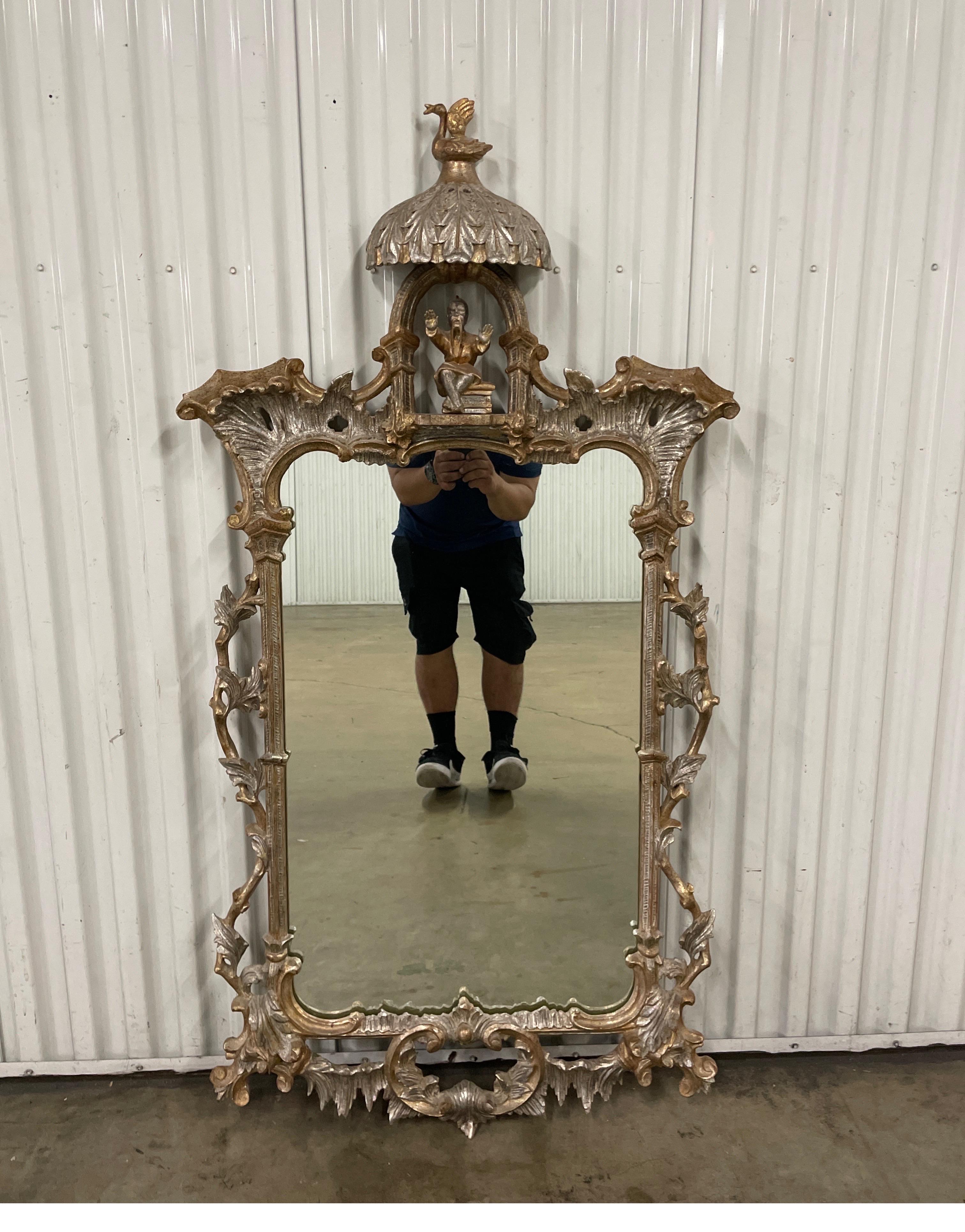 Chinese Chippendale style pagoda mirror in a gilded gold & silver finish. This is an outstanding example of this style of mirror.