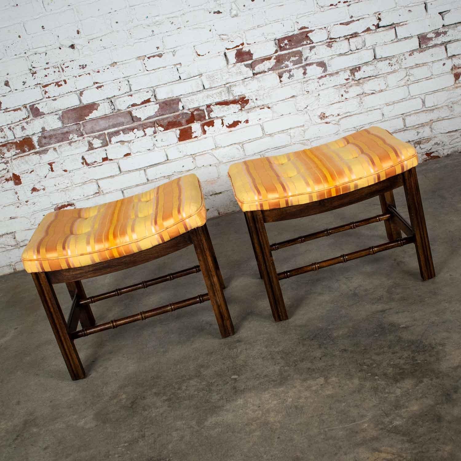 Gorgeous Chinese Chippendale orange and yellow striped upholstered pair of stools by Burlington House Furniture. Comprised of walnut stained hickory and upholstered seats. Wonderful vintage condition with minimal age appropriate wear. Please see